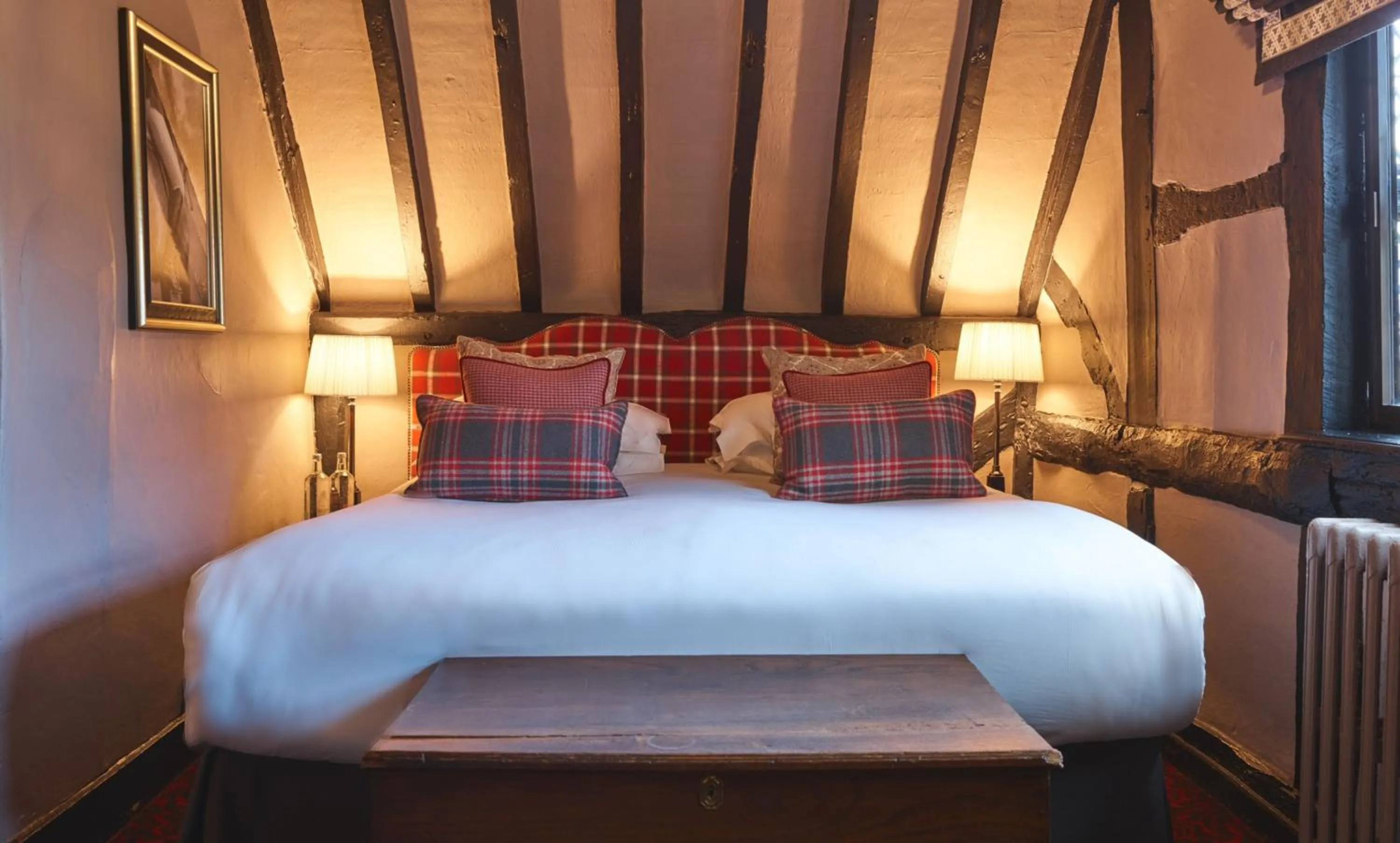 Bed in The Lygon Arms - an Iconic Luxury Hotel