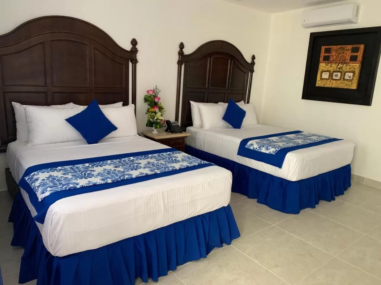 Bed in Hotel Catedral Valladolid Yucatan