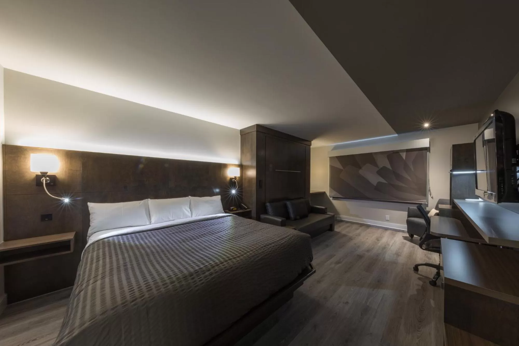 Bed in Hôtel & Suites Normandin Lévis