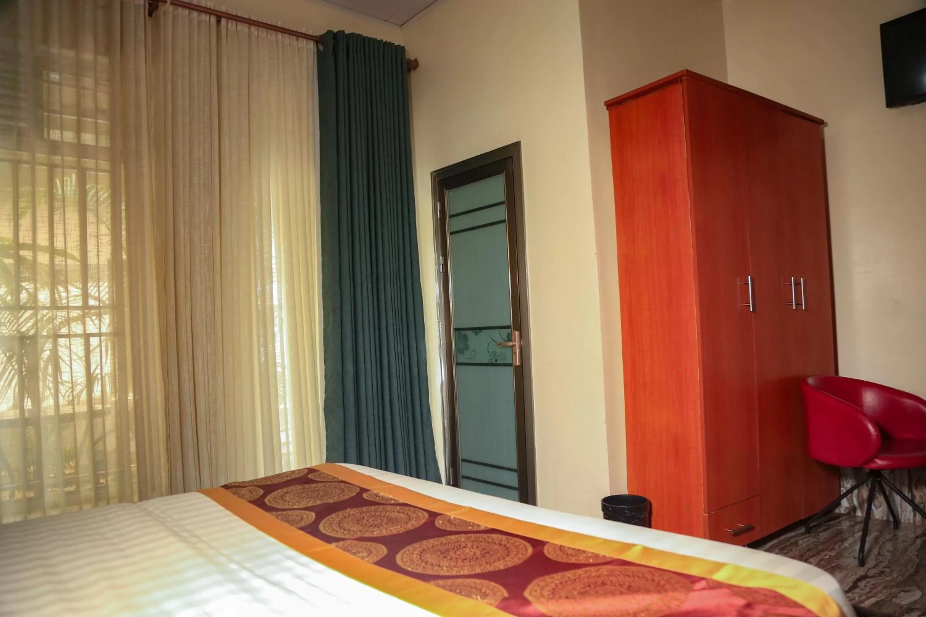 Bed in AVISHA TOWN HOTEL