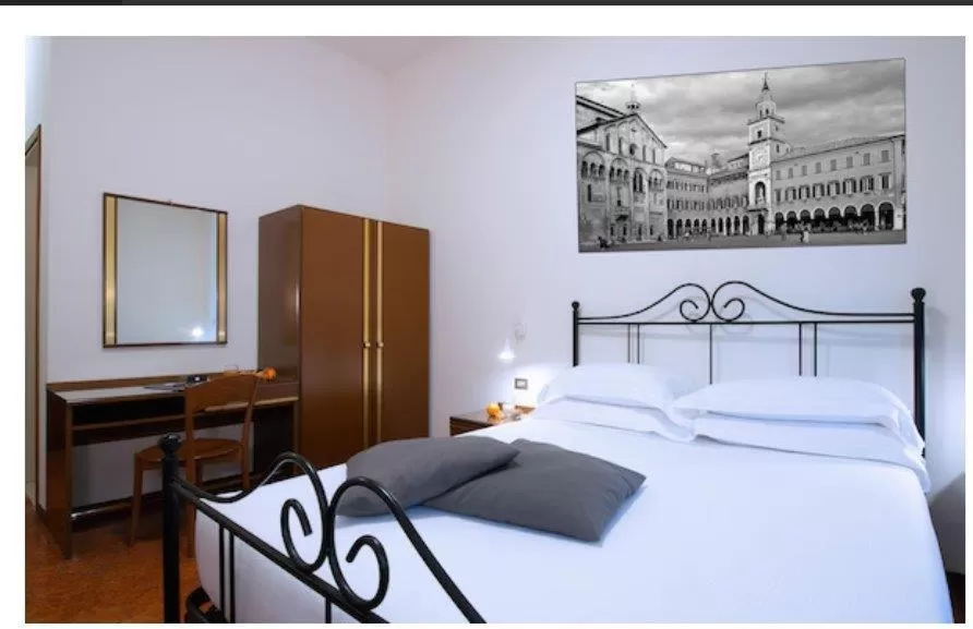 Photo of the whole room, Bed in CDH Hotel Modena