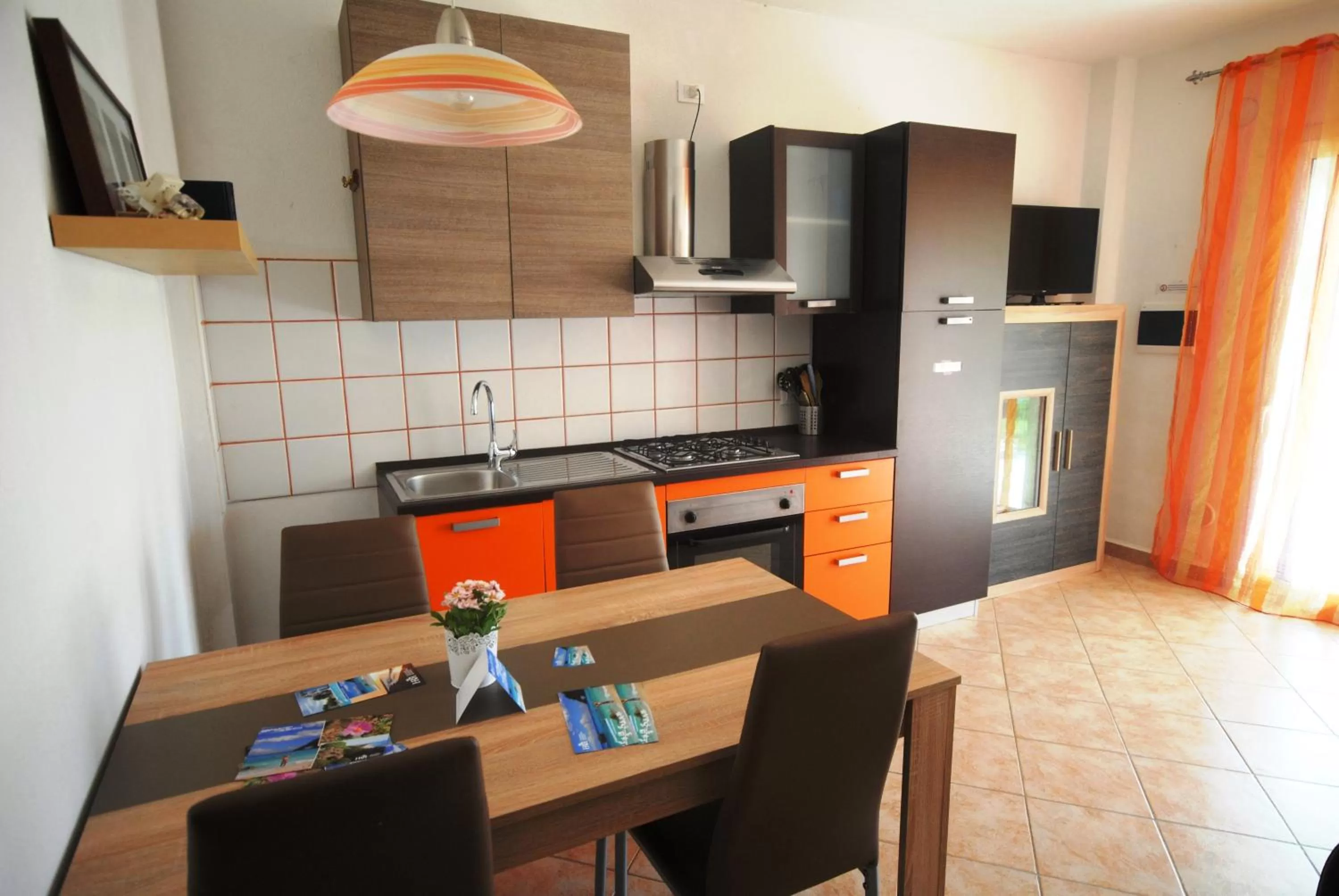 Kitchen or kitchenette in Holiday Residence Rifugio