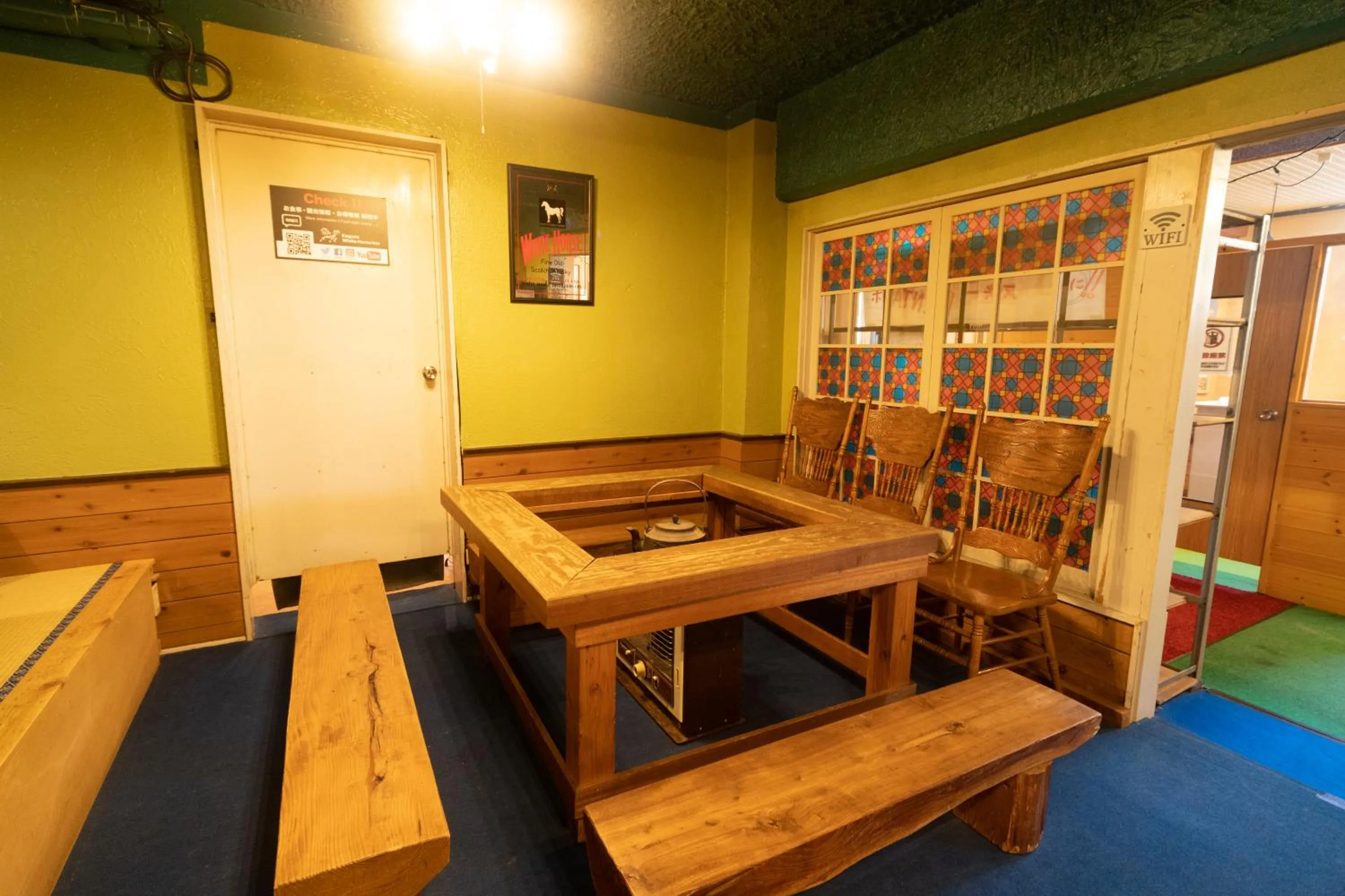 Communal lounge/ TV room in Kagura White Horse Inn