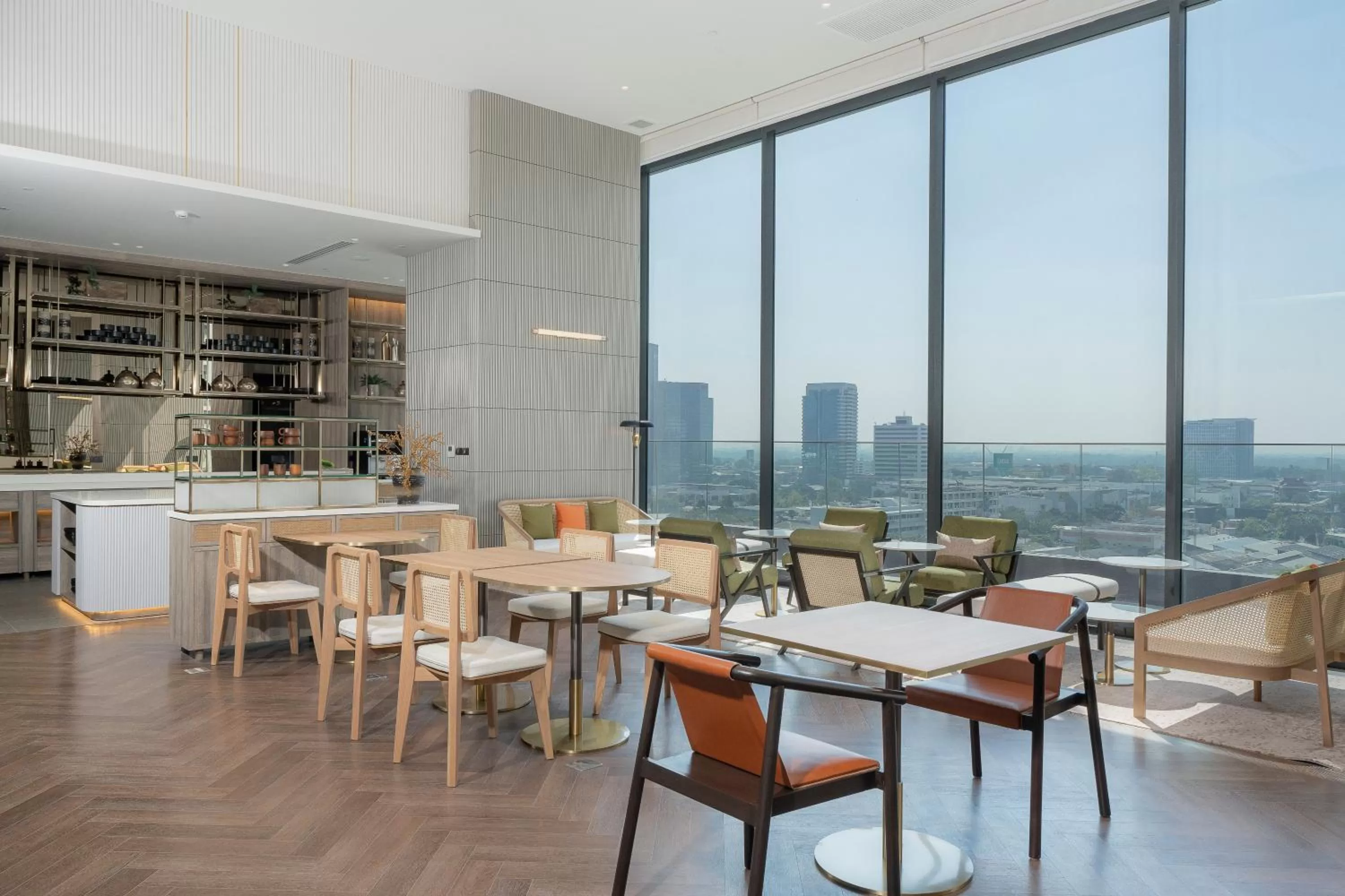 Communal lounge/ TV room in Staybridge Suites Bangkok Sukhumvit by IHG