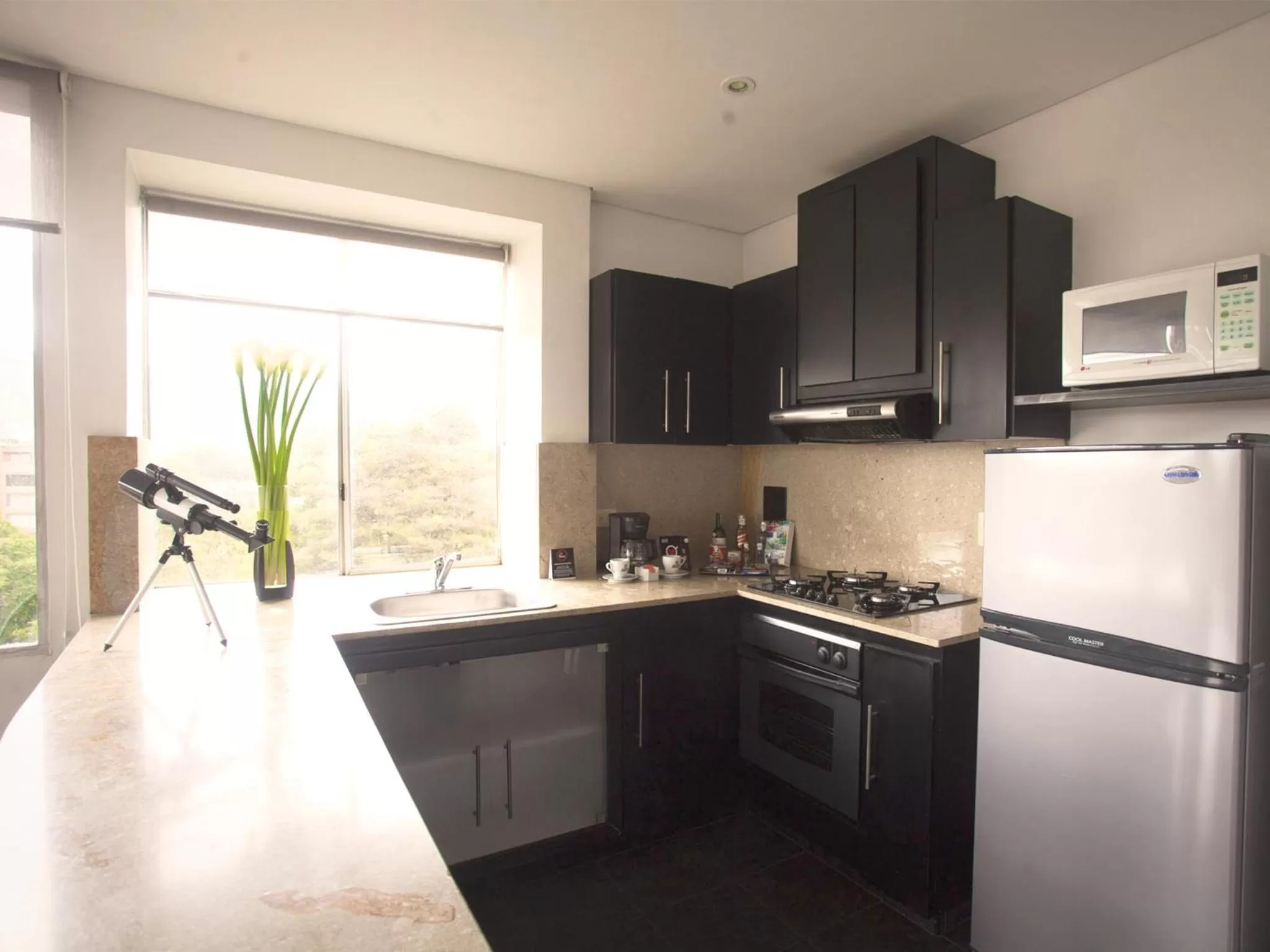 Kitchen or kitchenette in Hotel 104 Art Suites