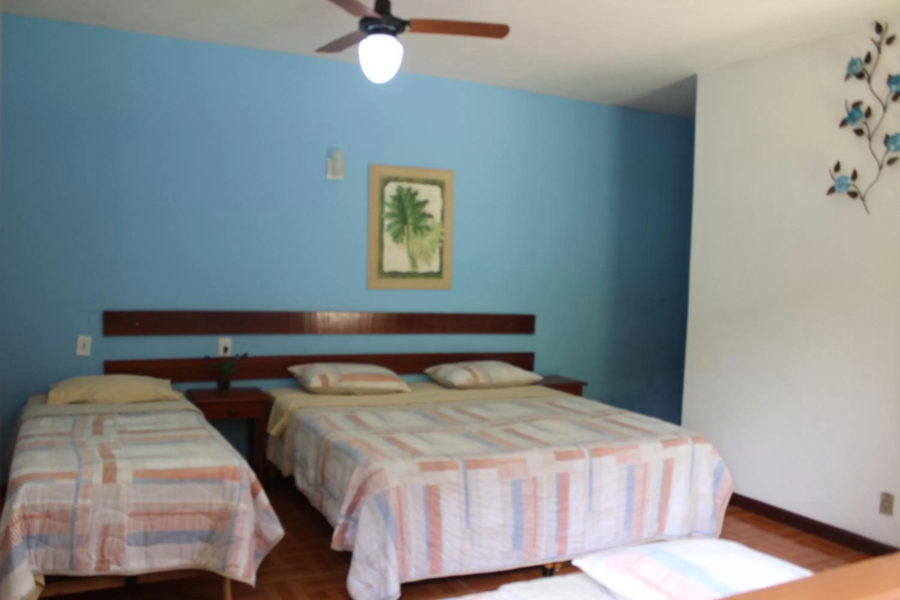 Bed in Pousada Flor de Paraty