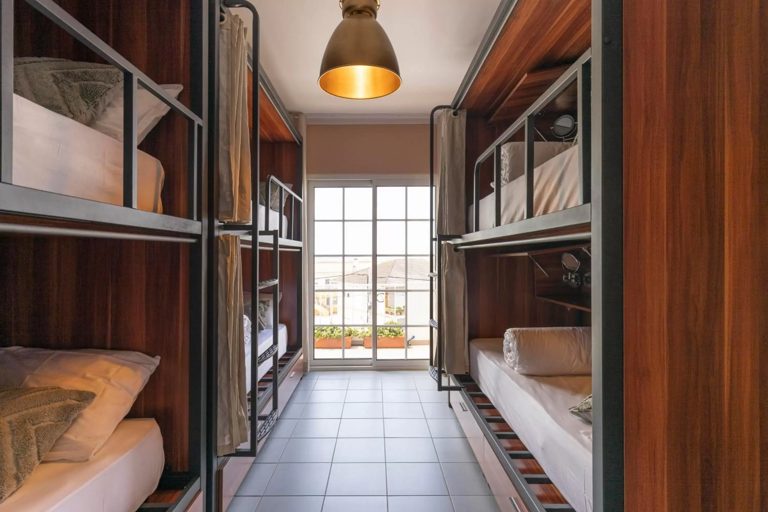 Bed in 8-Bed Dormitory Room in Malacuna Peniche Bed in 8-Bed Dormitory Room in Malacuna Peniche