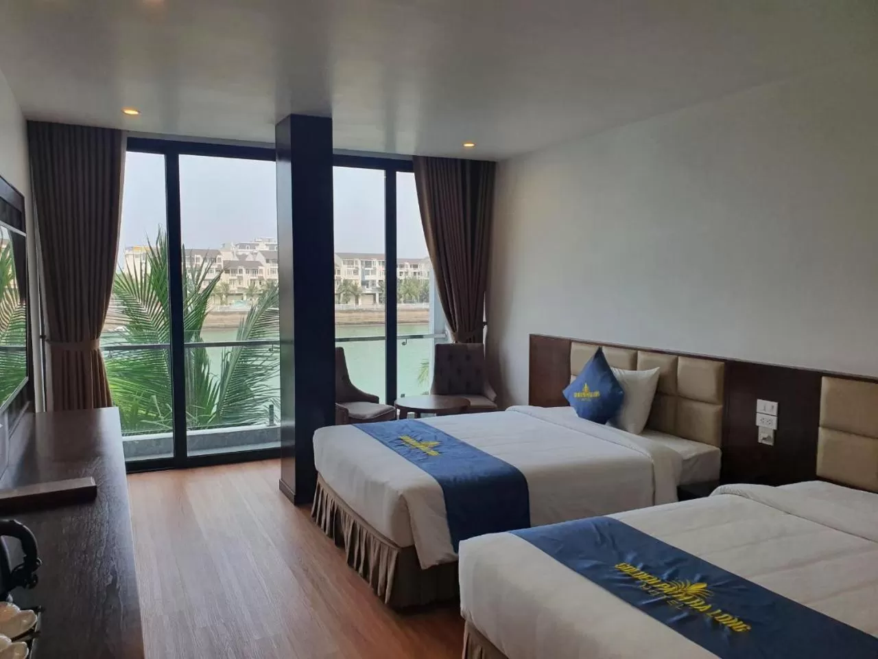 Bed in Golden Palm HaLong Hotel