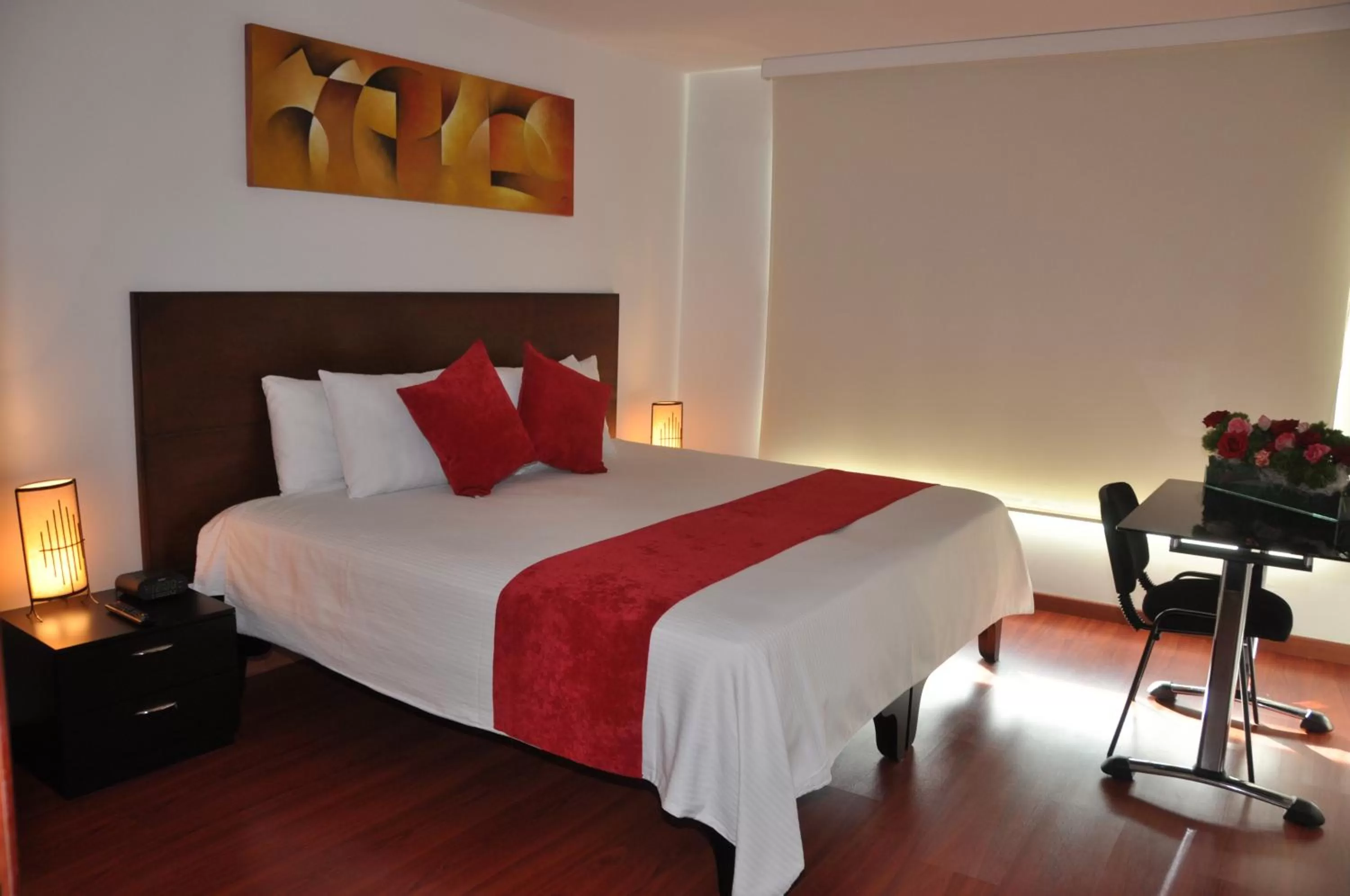 Bed in Apartasuites Plaza Modelia