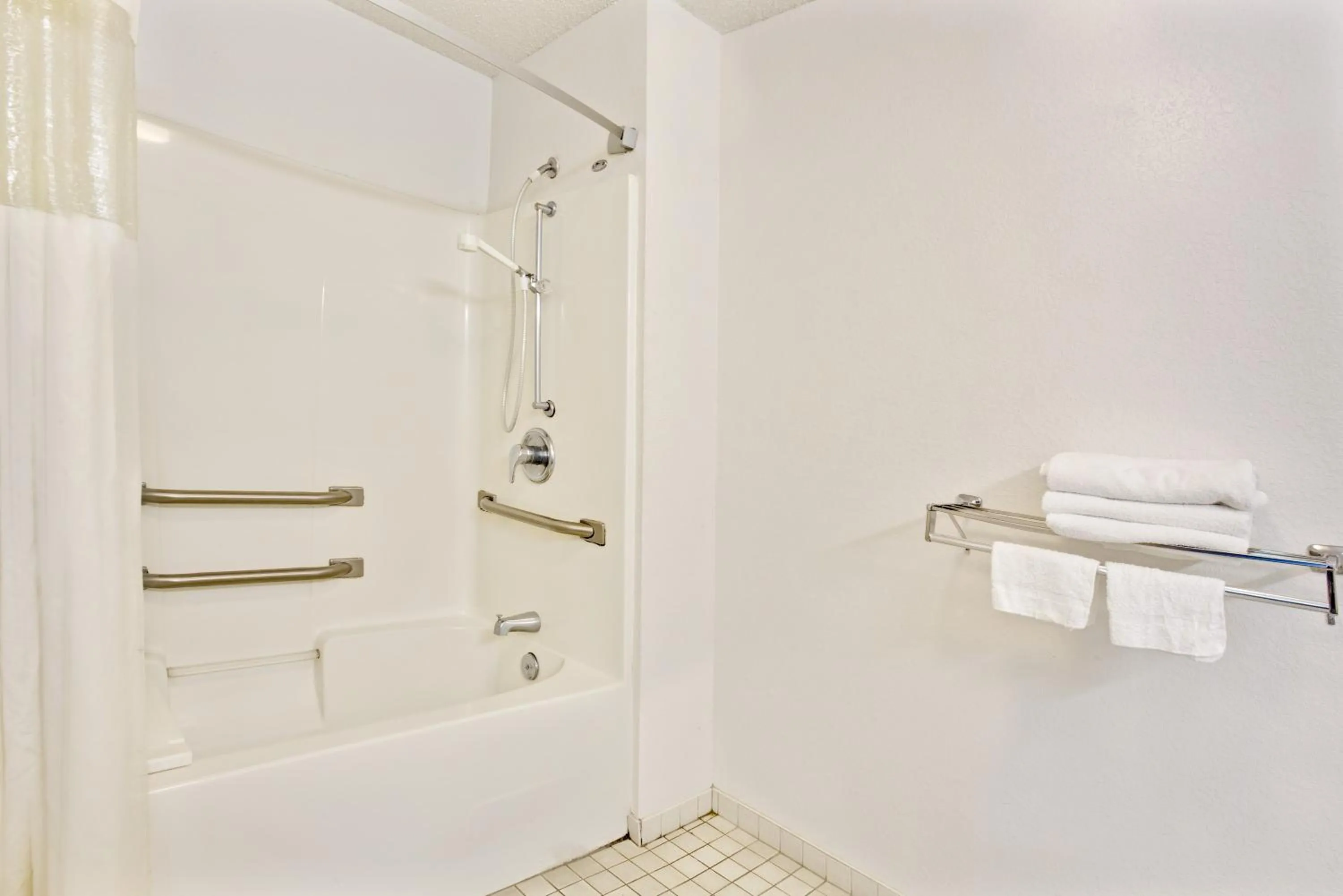 Shower in Travelodge Suites by Wyndham MacClenny I-10