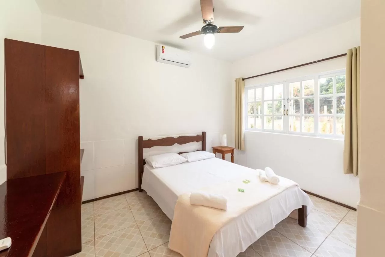 Bed in Pousada Portal de Paraty