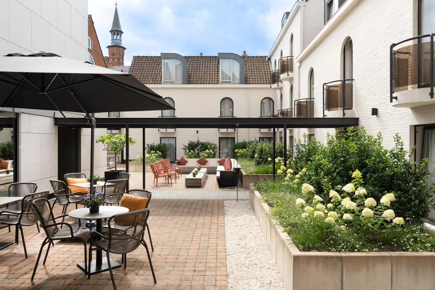 Inner courtyard view in Dukes' Academie Brugge - by Dukes' Hotel Collection