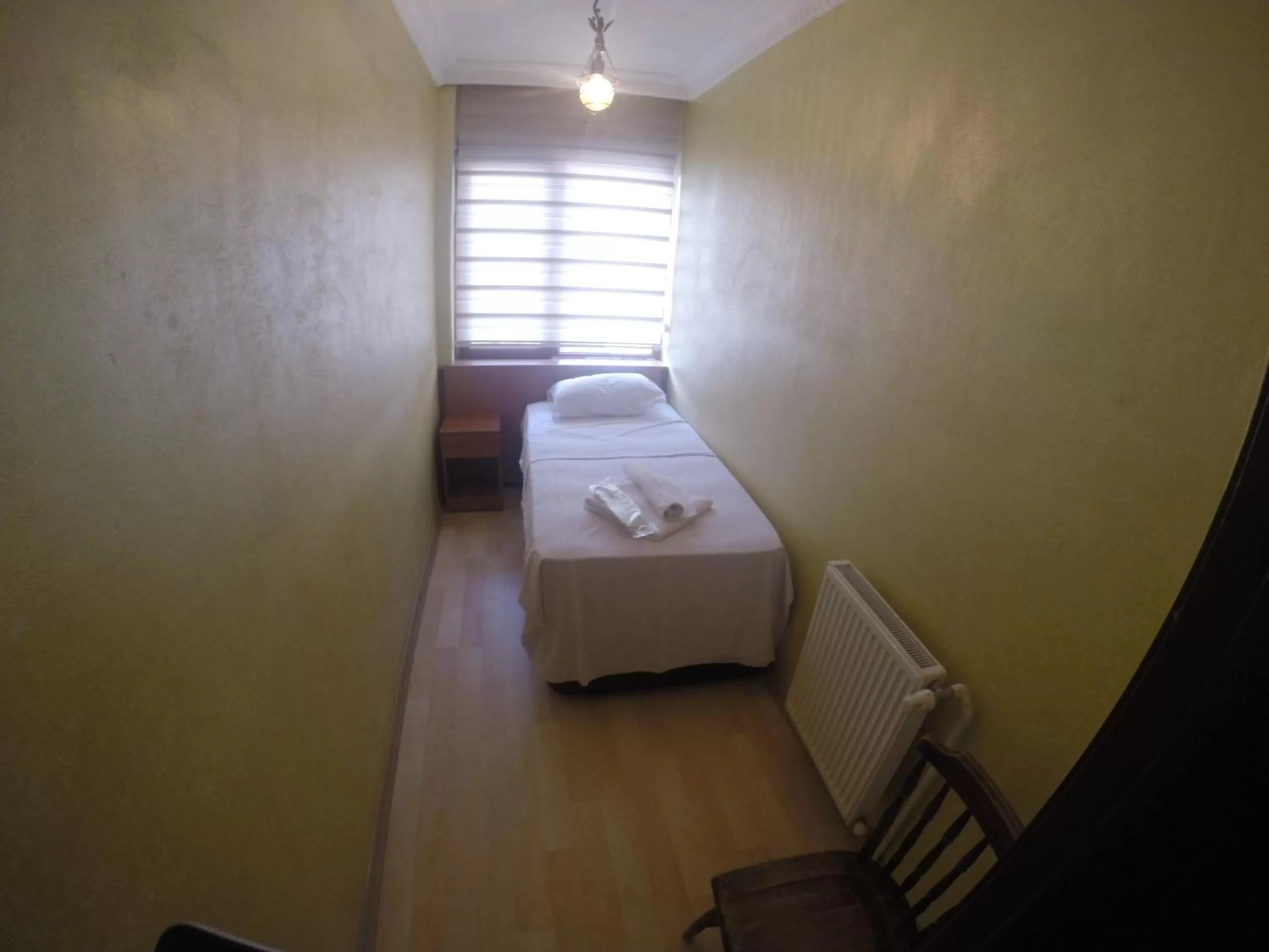 Bed, Room Photo in Arat Apartments
