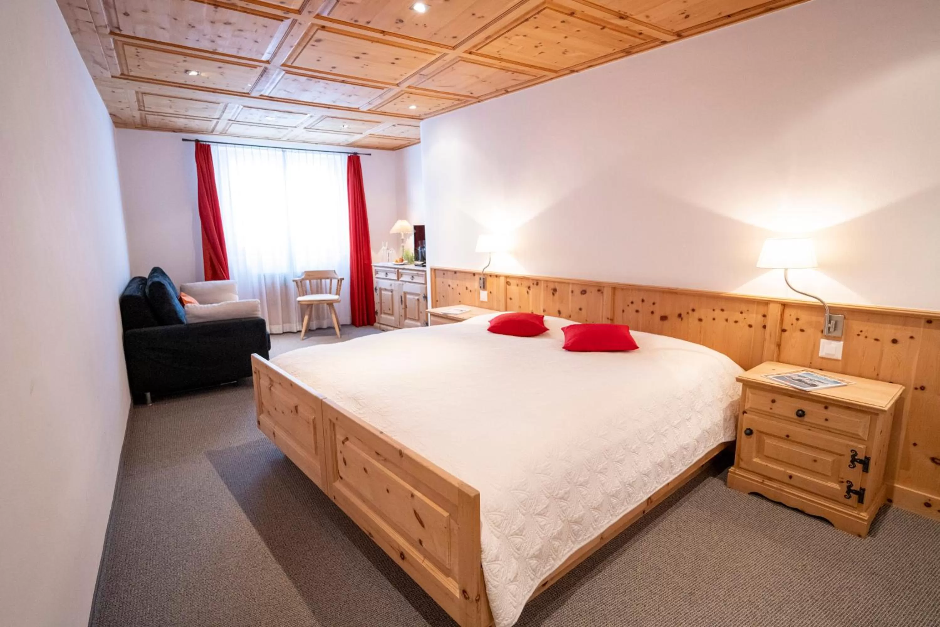 Bed in Hotel Engiadina