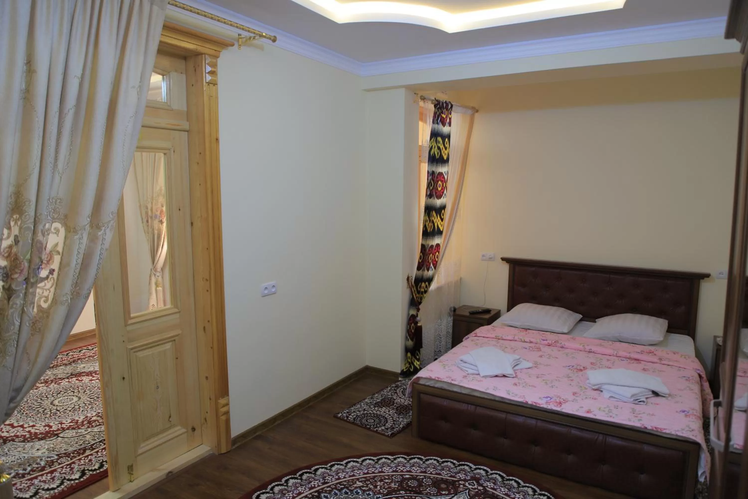 Bed in Tilyakori Hotel