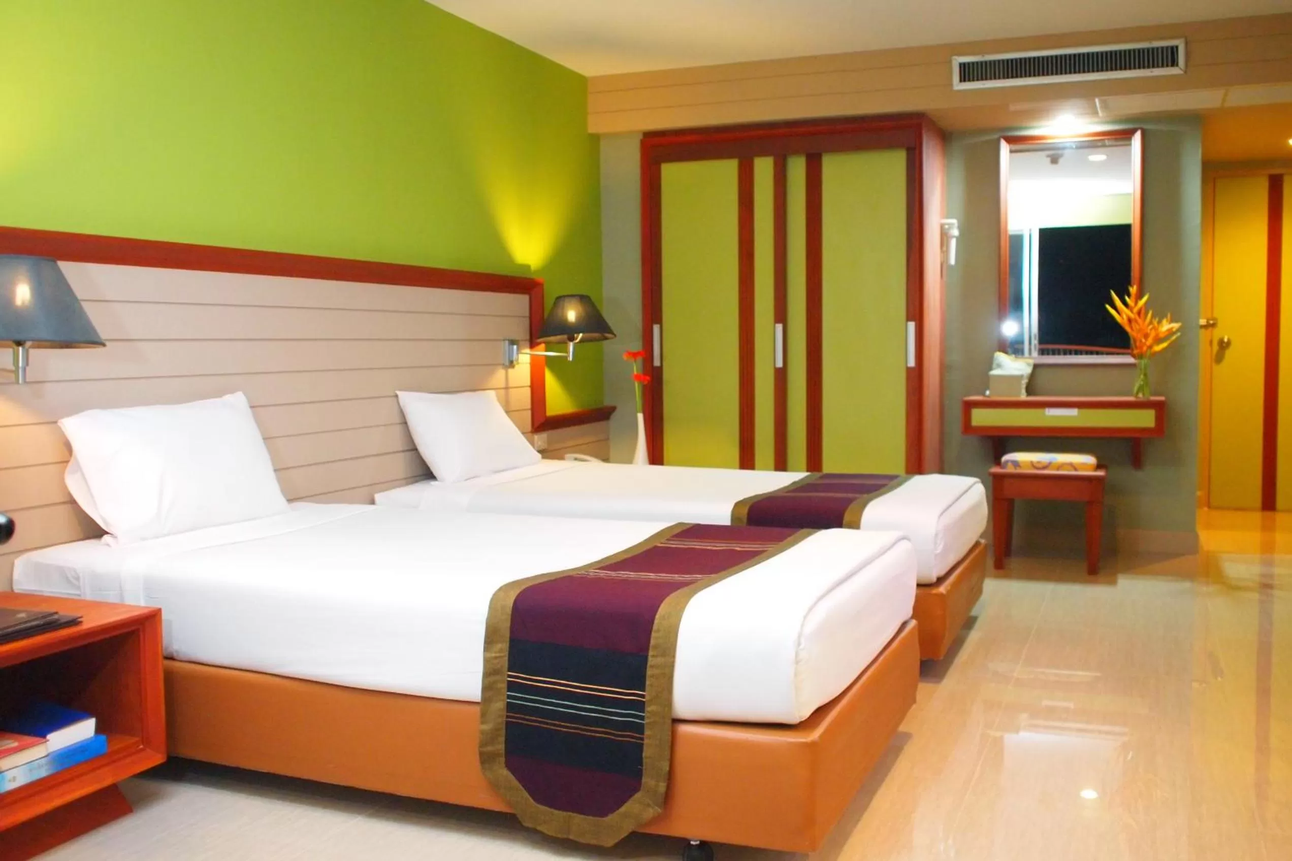 Bed in Long Beach Cha-Am Hotel