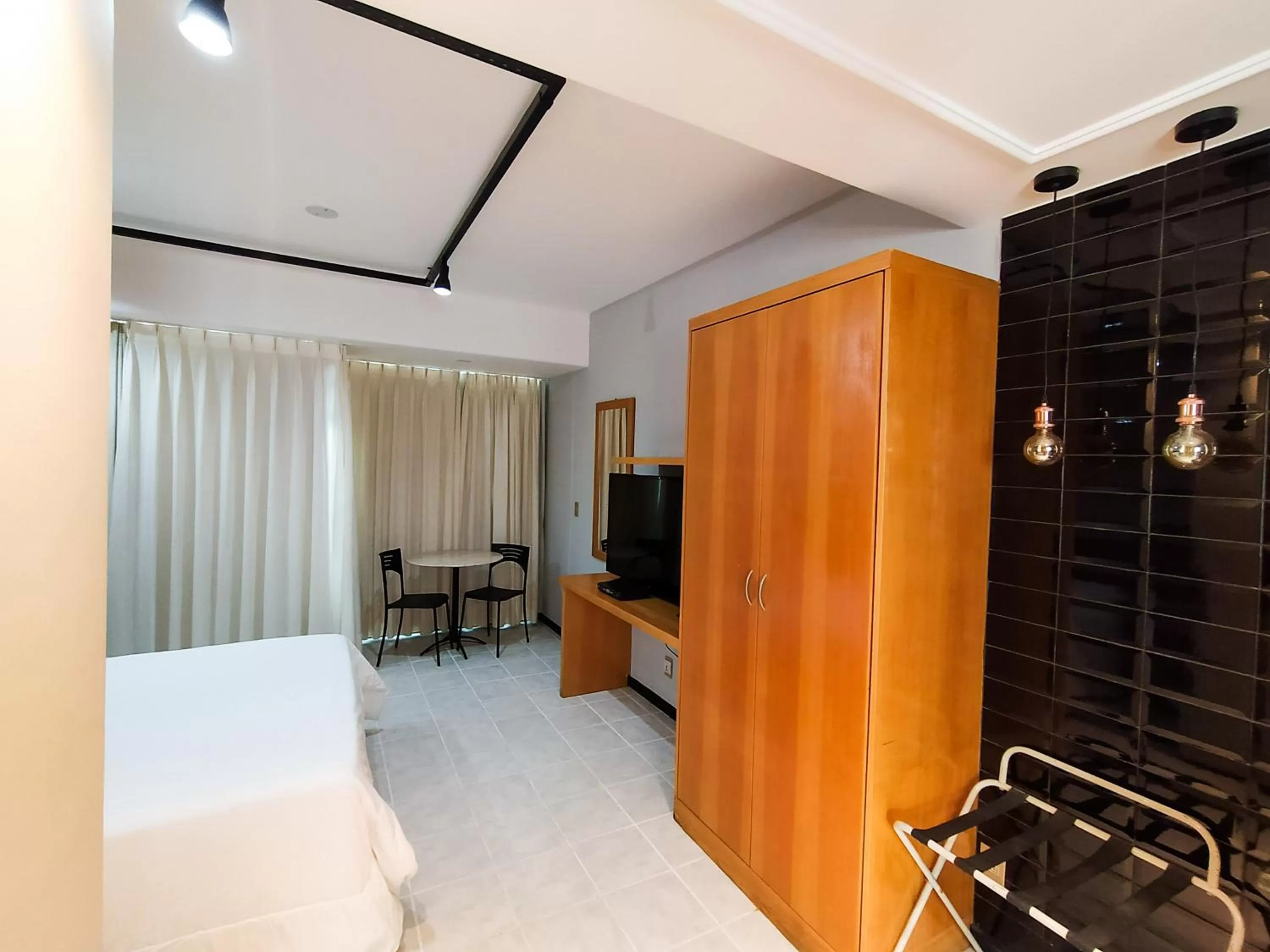 Bed in Savassi Village