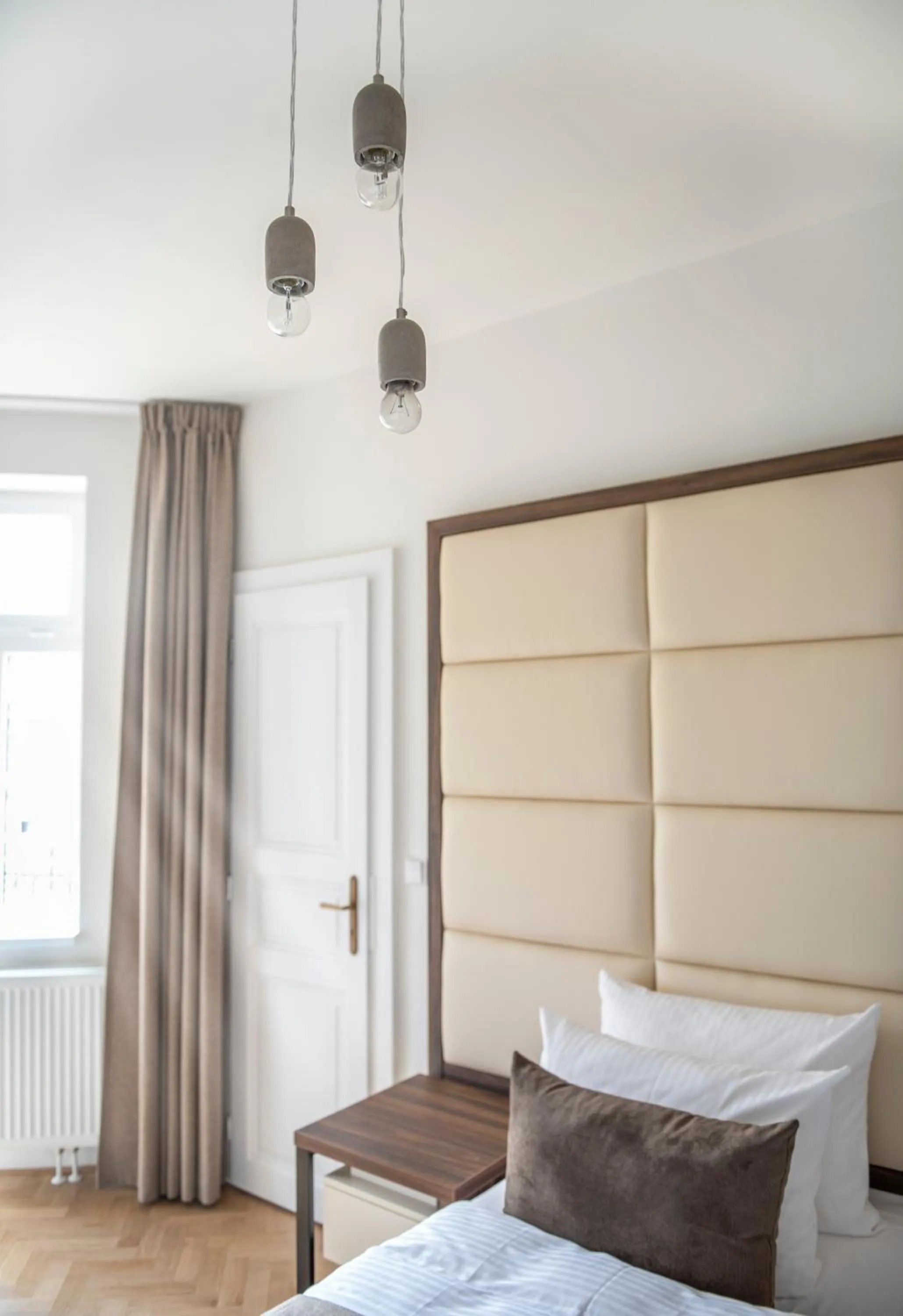 Bed in Letna Garden Suites