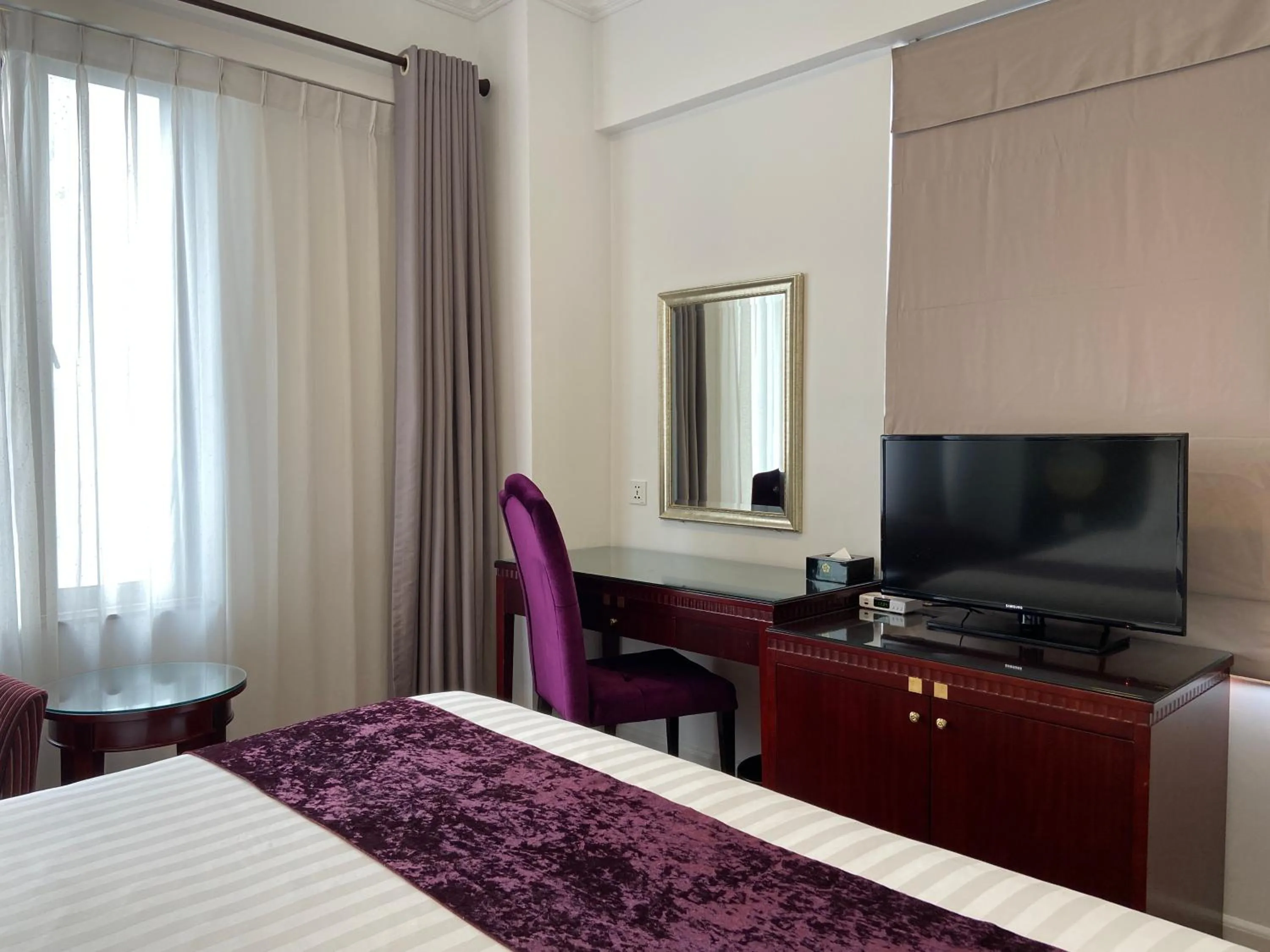 Bed in Flower Garden Hotel