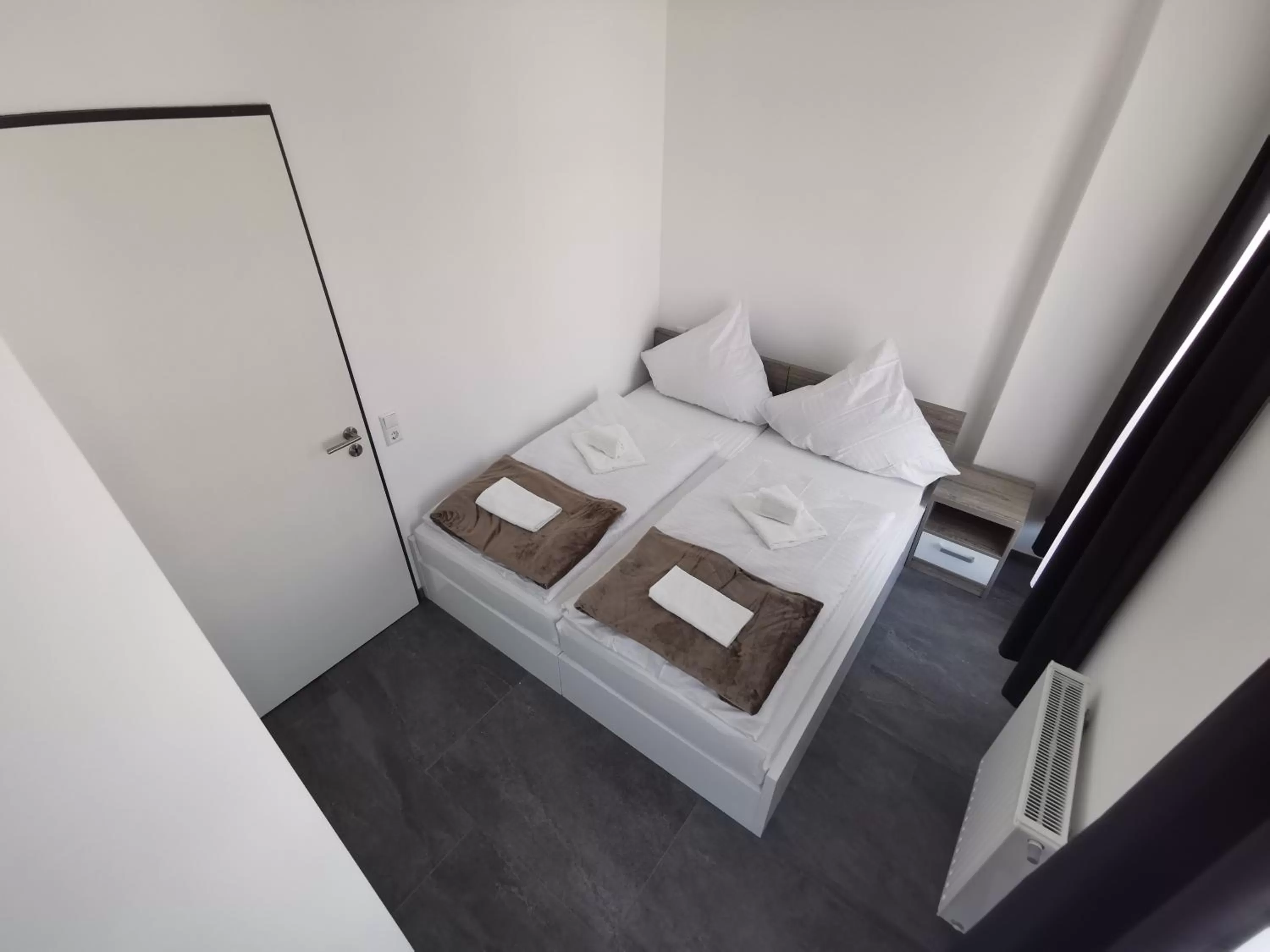 Bed in HP Apartments