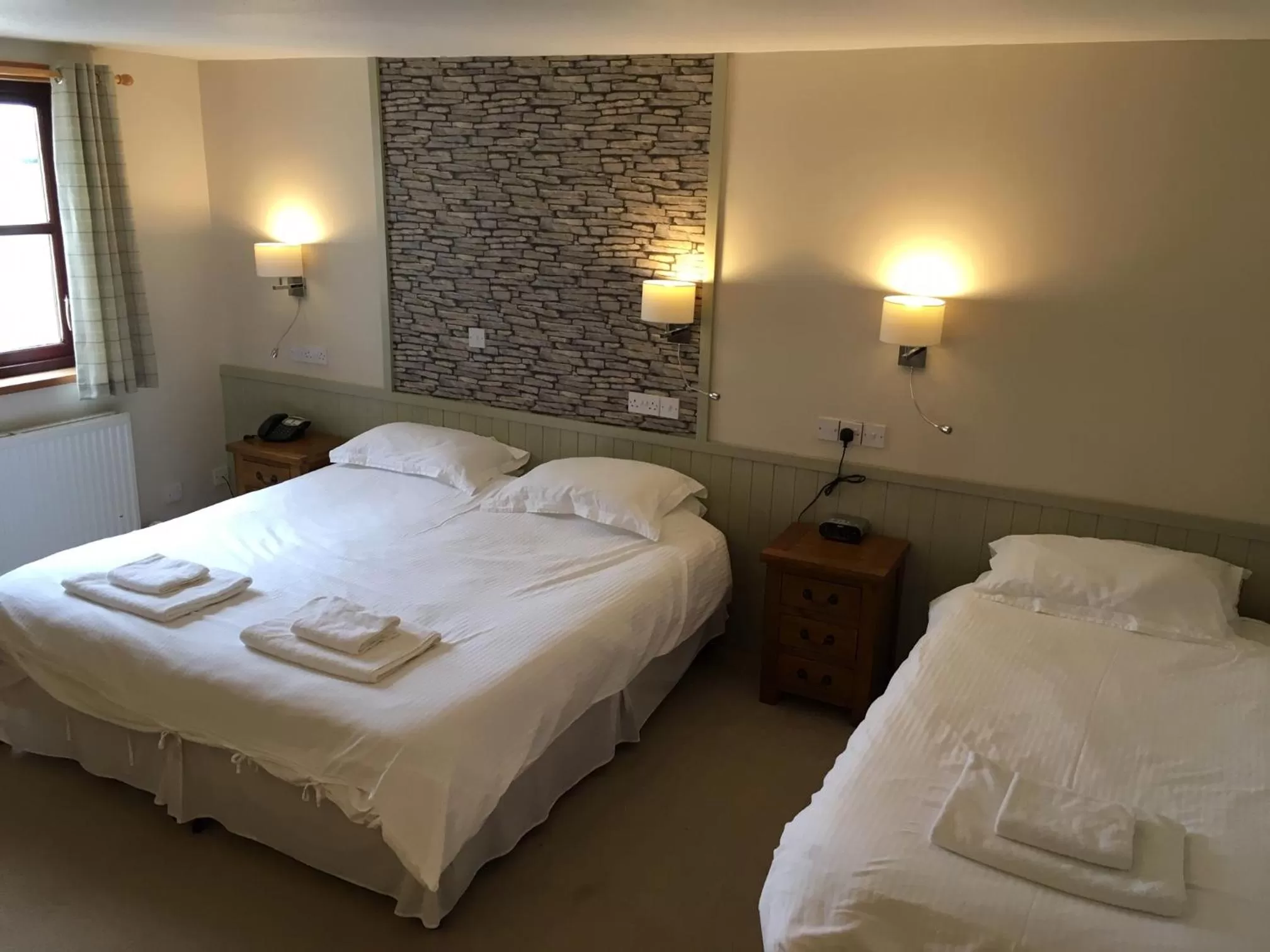 Bed in Standing Stones Hotel