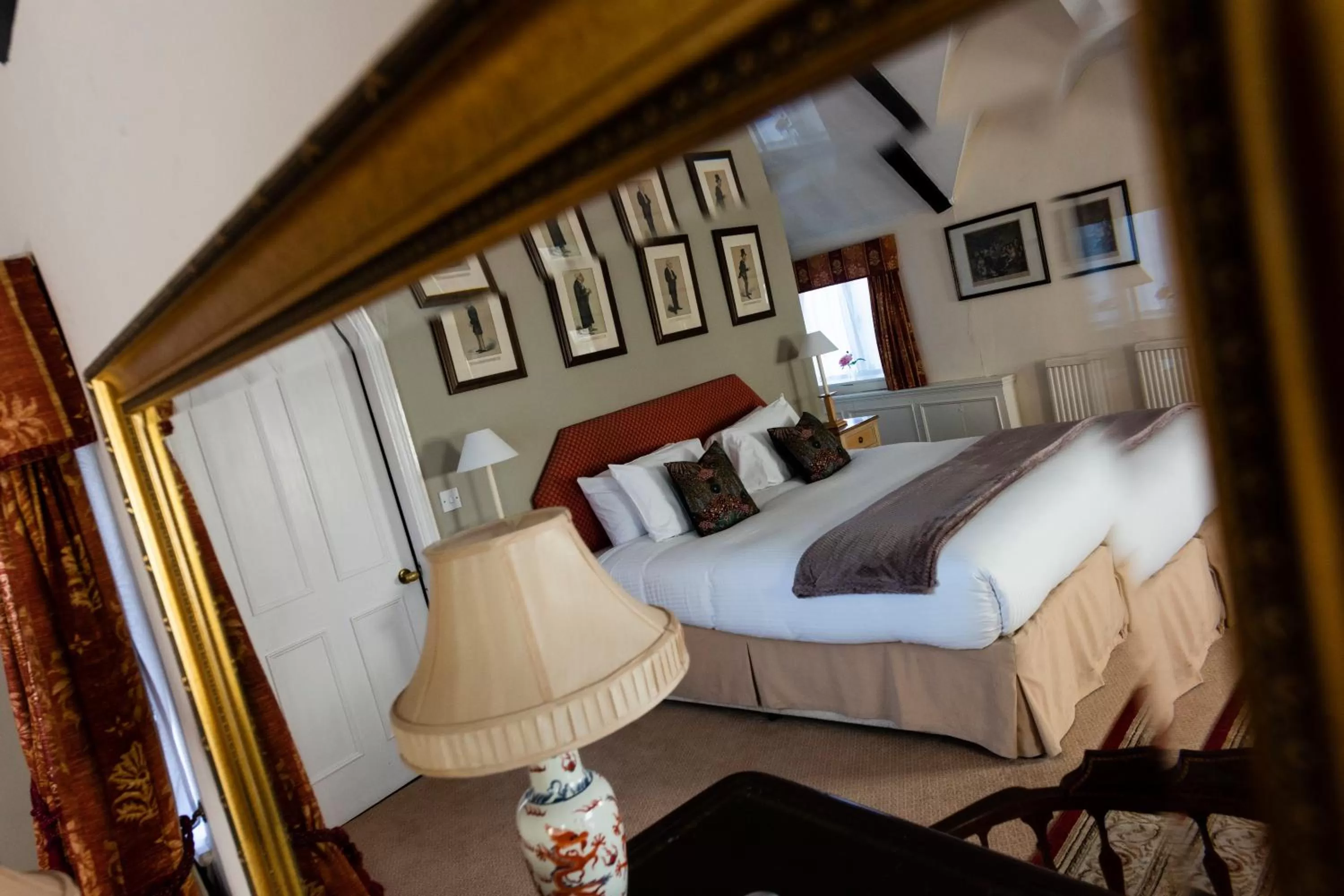 Bed in The Whipper-In Hotel