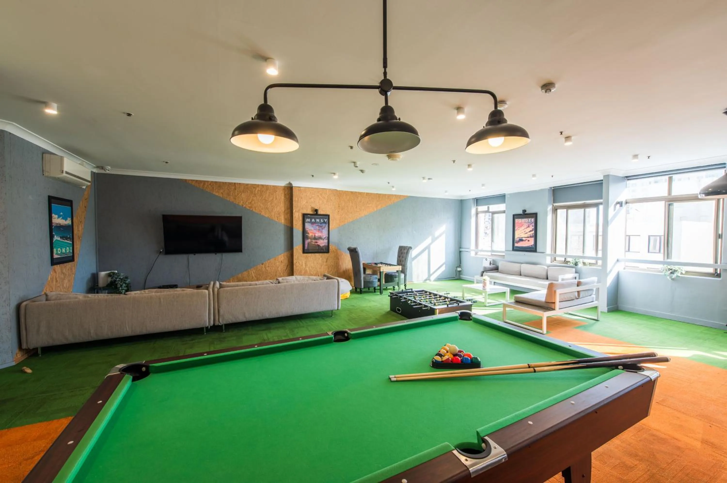 Communal lounge/ TV room in Space Q Capsule Hotel