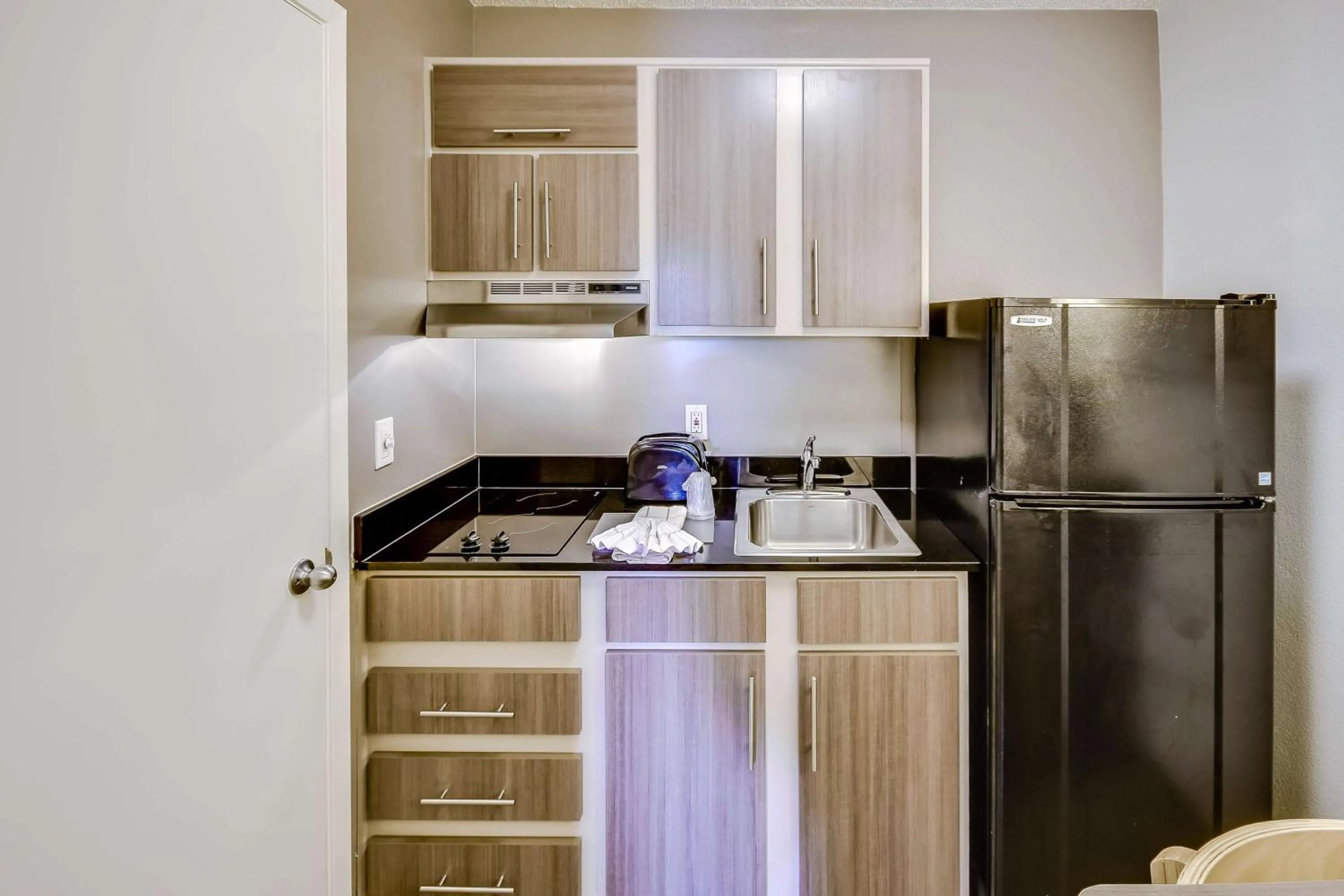 Kitchen or kitchenette in Studio 6-Houston, TX - Hobby South