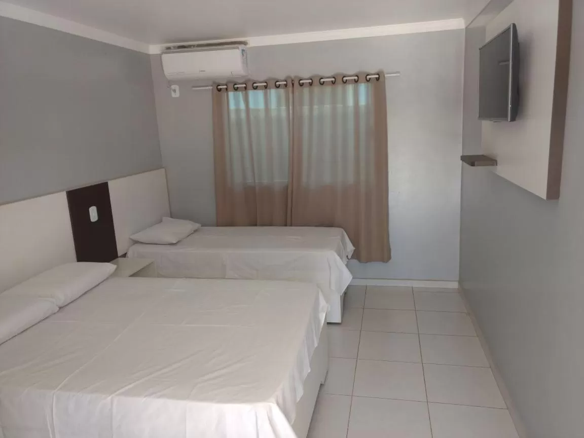 Bed in Hotel Serra do Rio