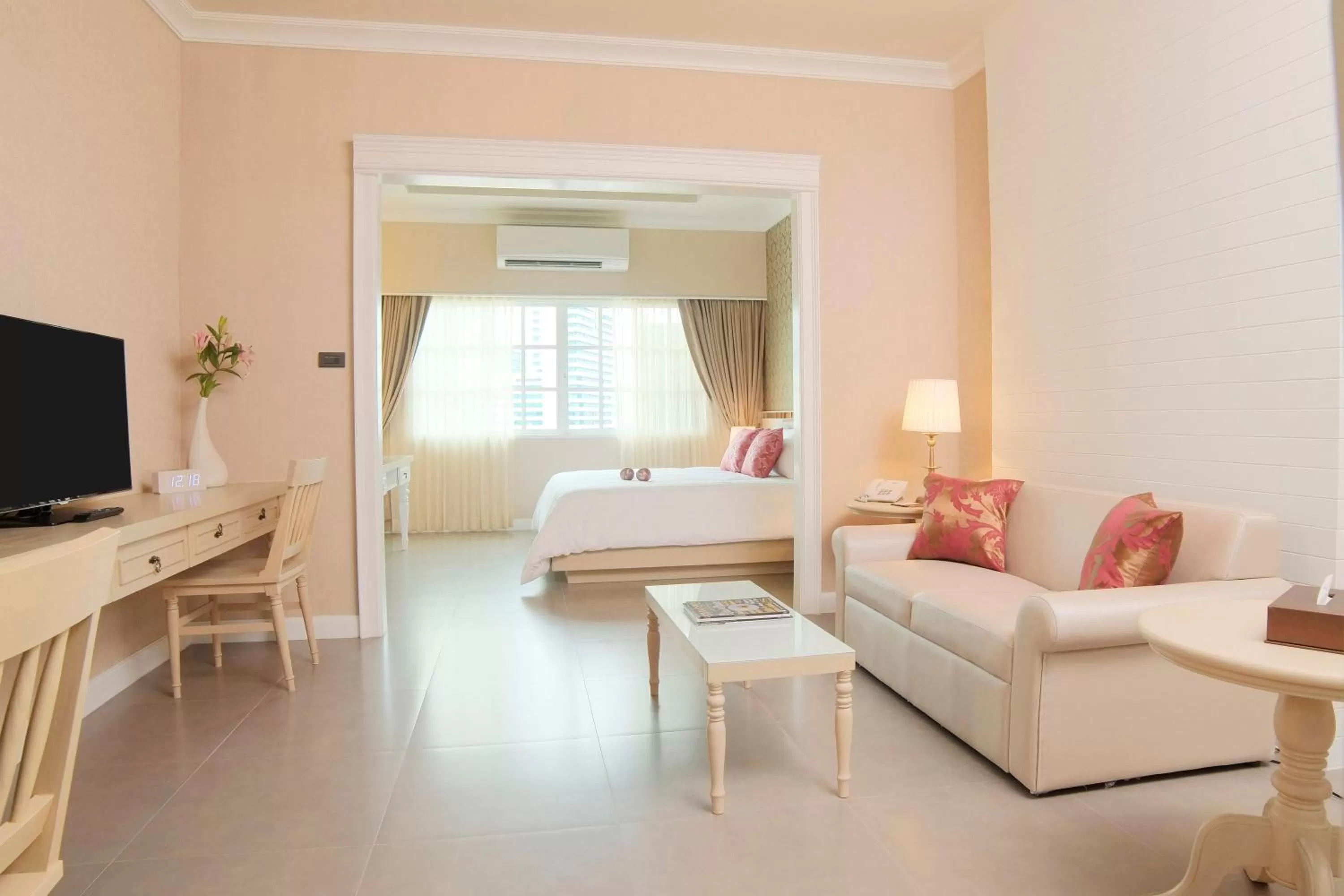 Living room, Bed in The Raya Surawong Bangkok