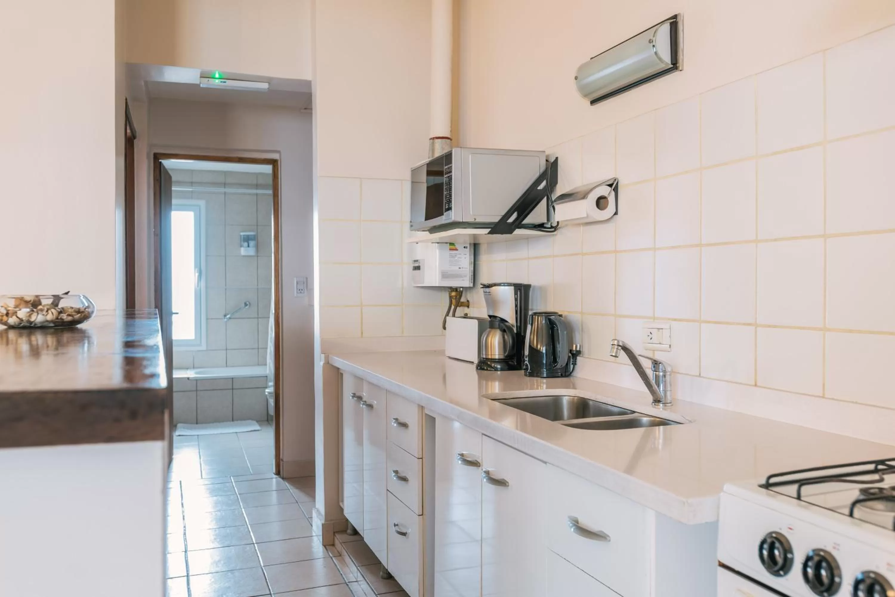 Coffee/tea facilities, Kitchen/Kitchenette in Riviera Fueguina Apartments