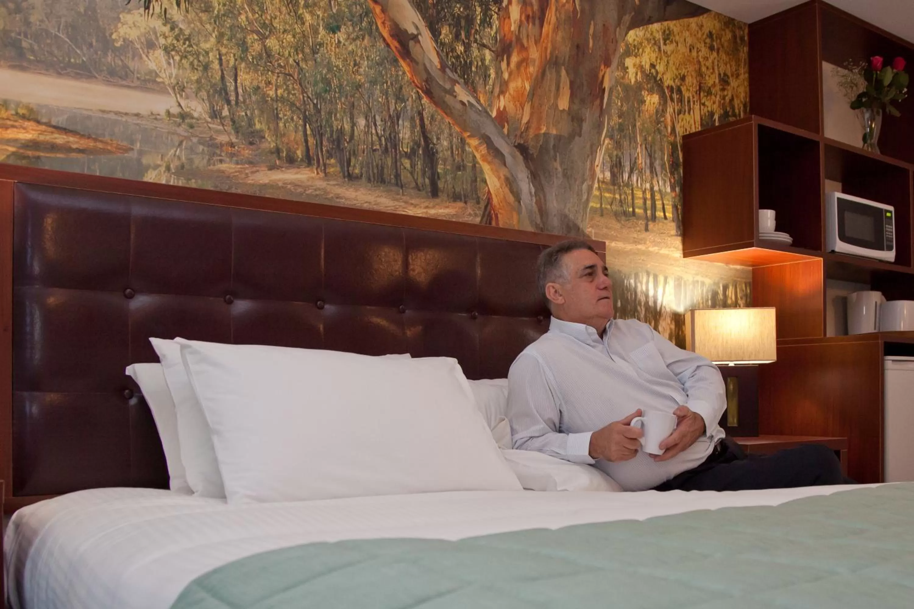 Kitchen or kitchenette, Bed in Grand Hotel and Studios