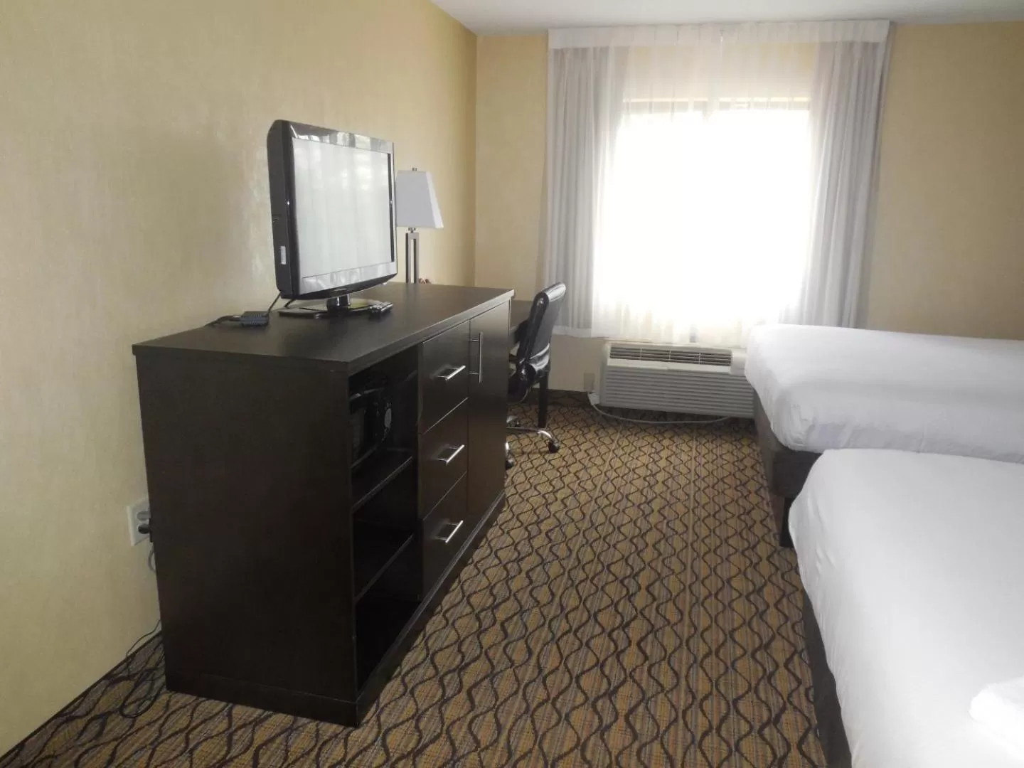 Photo of the whole room, Bed in Baymont by Wyndham Bridgeport/Frankenmuth