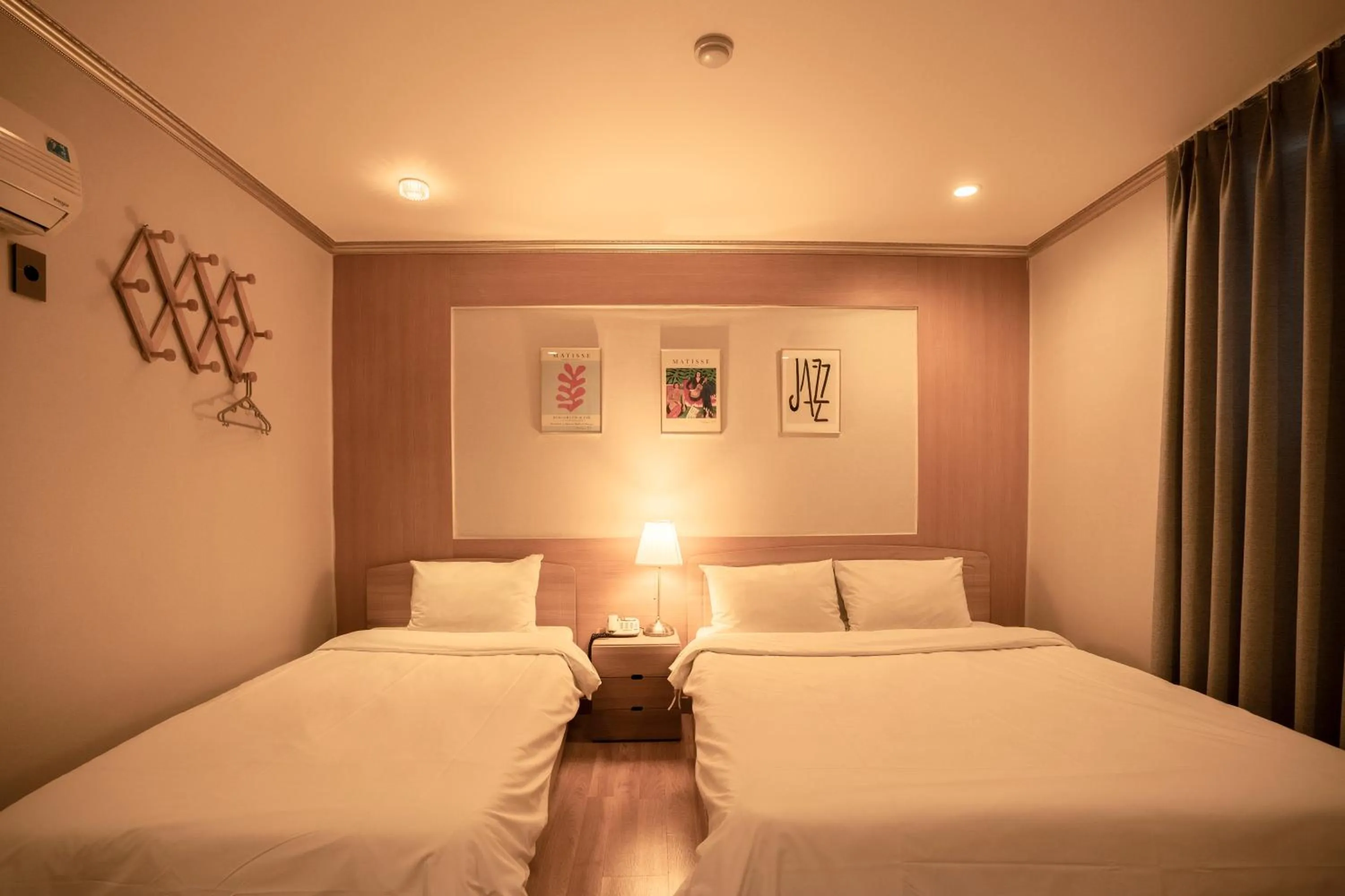 Bed in Jeju Stay Hotel