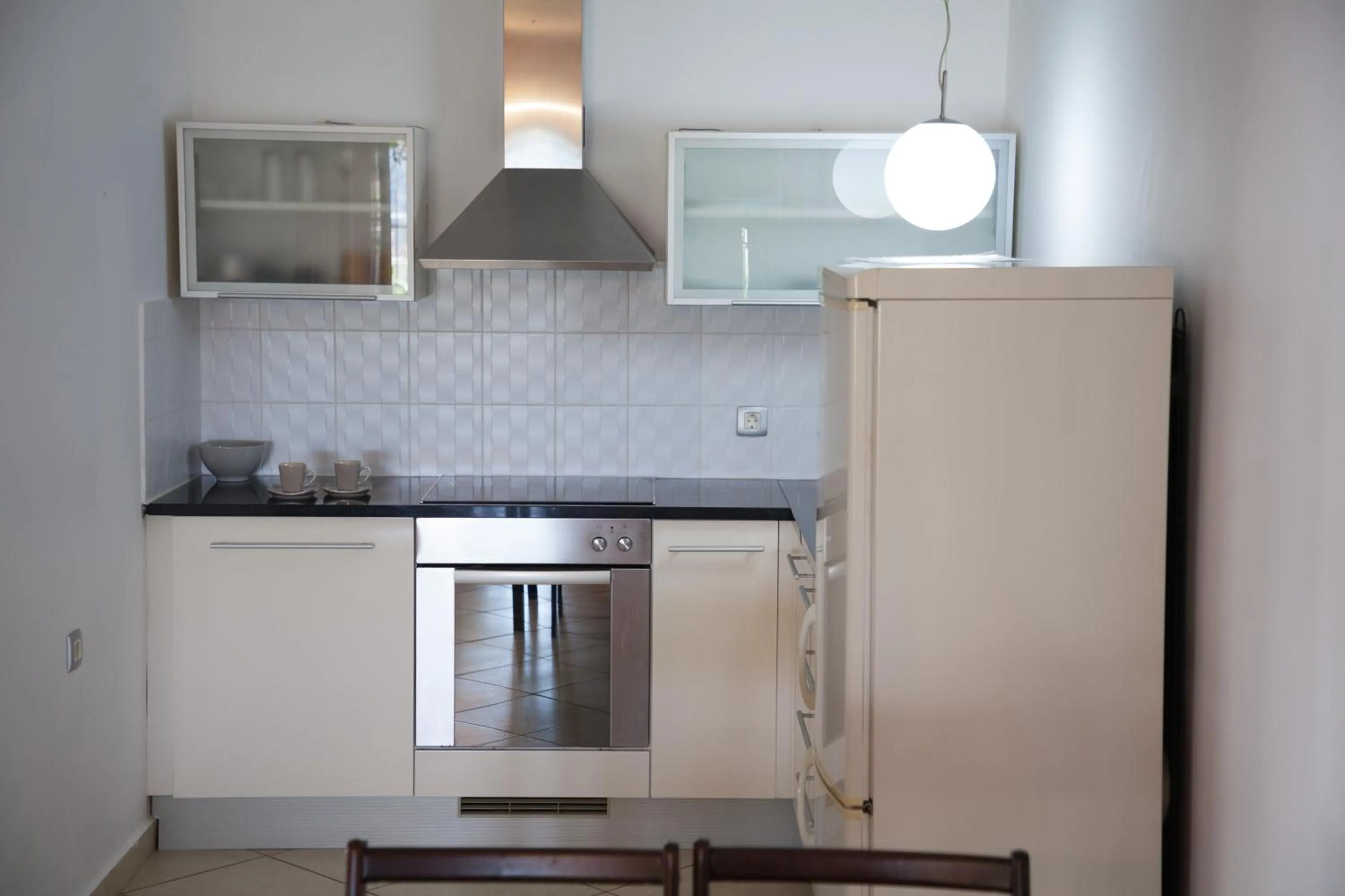 Kitchen or kitchenette in Spa Resort Bečići