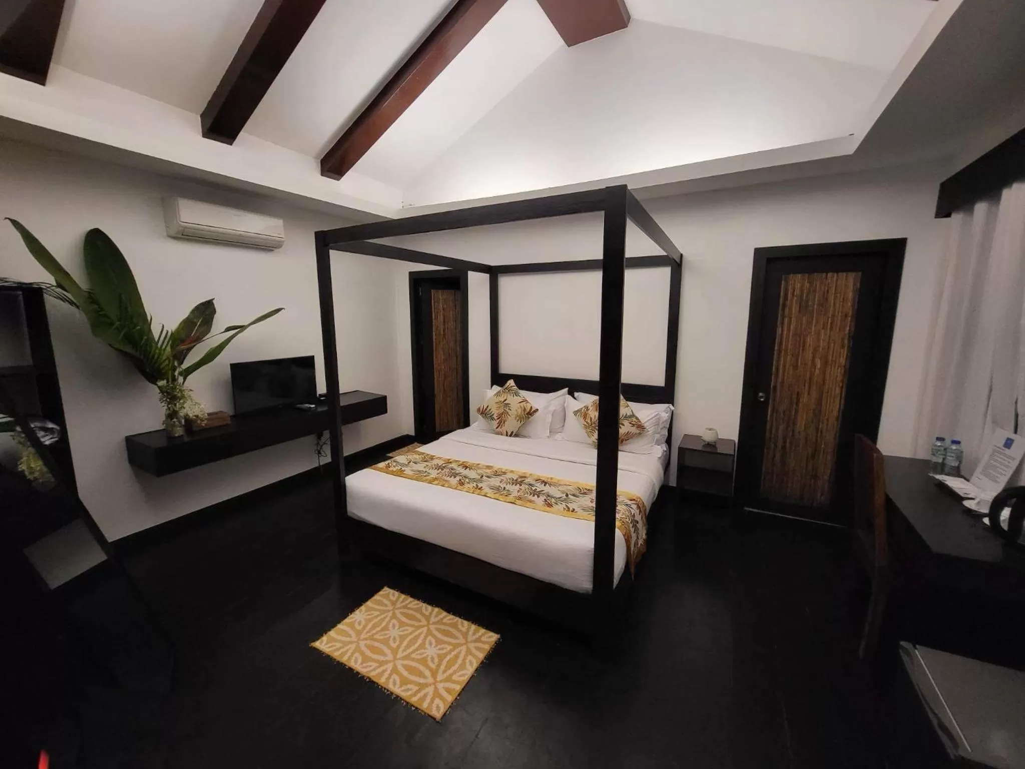 Bed in Lio Villas Resort