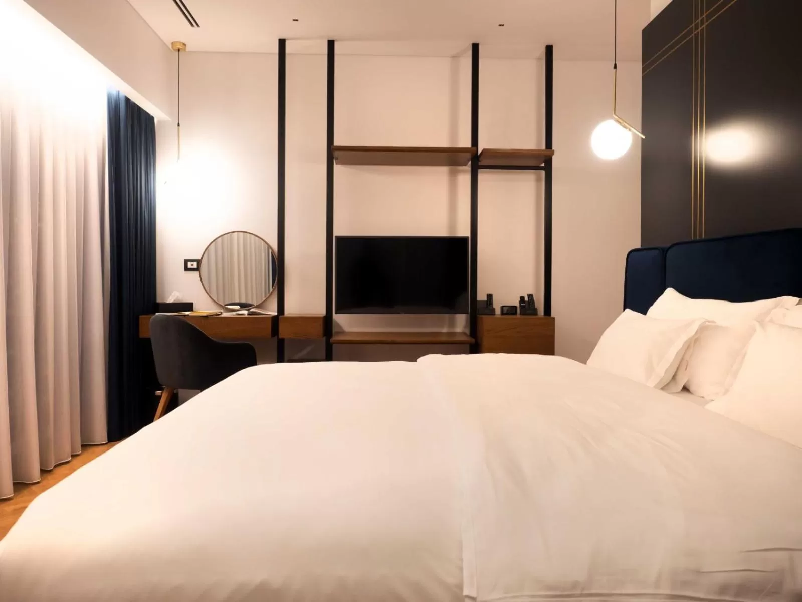 Bed in Moncafe BoutiqueHotel Spa