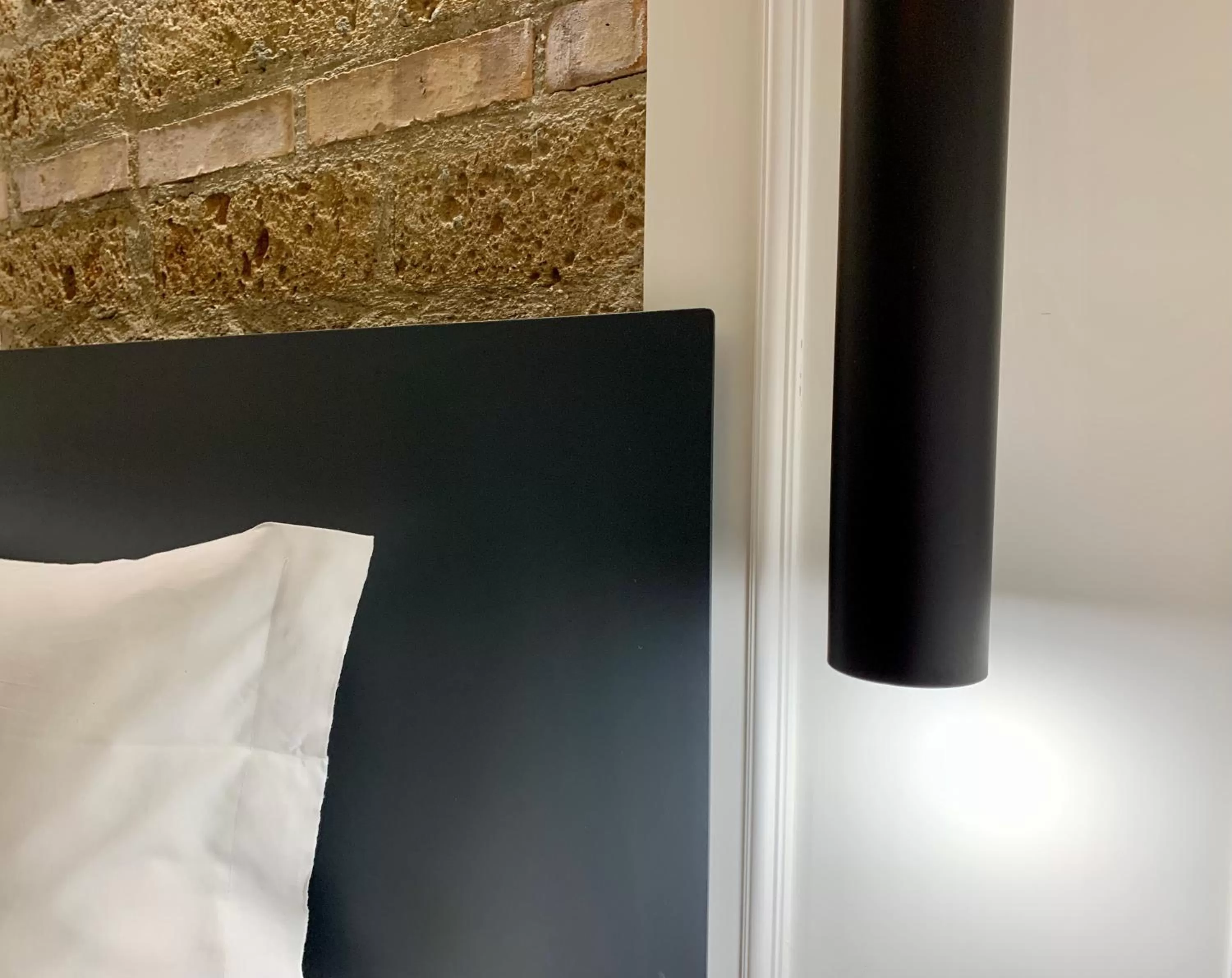 Bedroom in Toledo Boutique Rooms