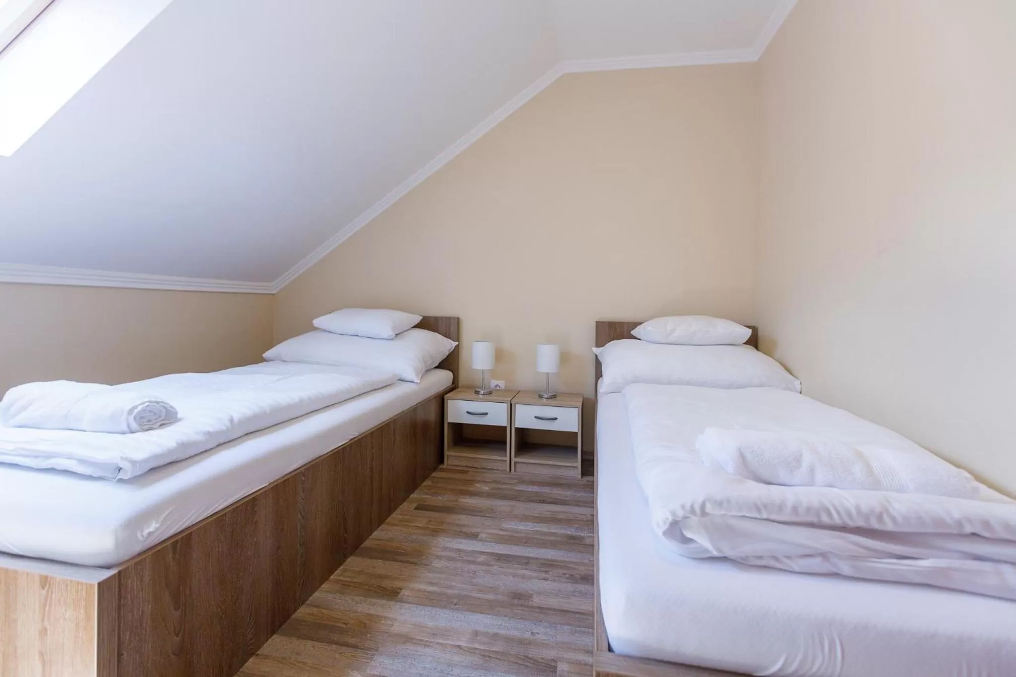 Bed in Central Panzió Gyula