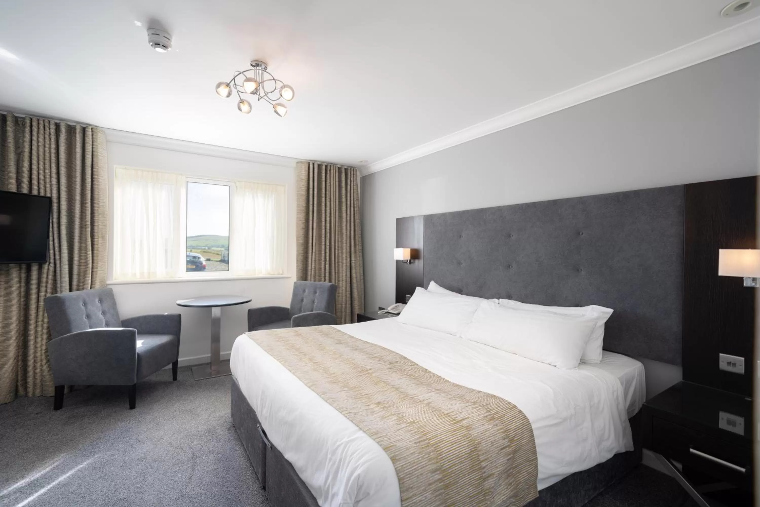 Bed in The Cliff Hotel & Spa