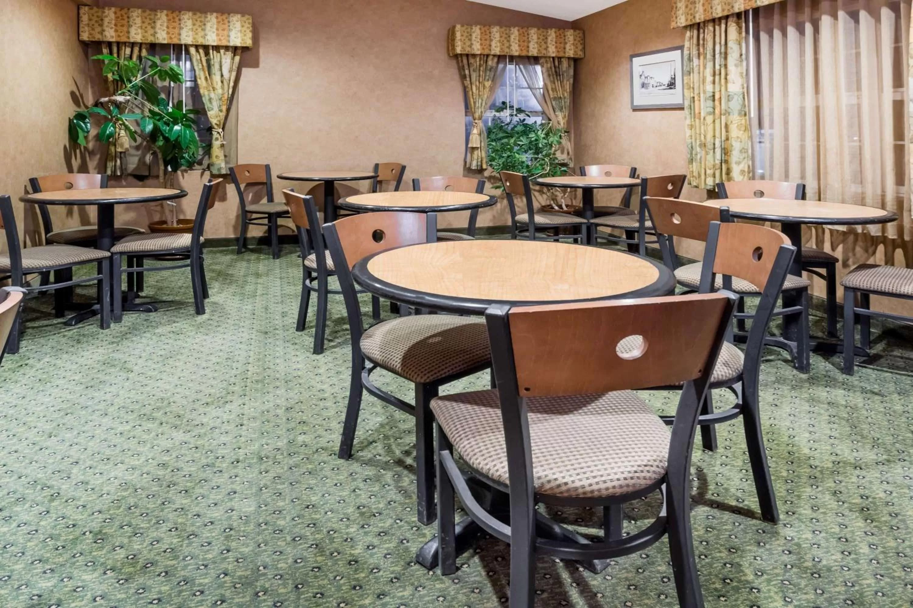 Seating area in Ramada by Wyndham Frisco