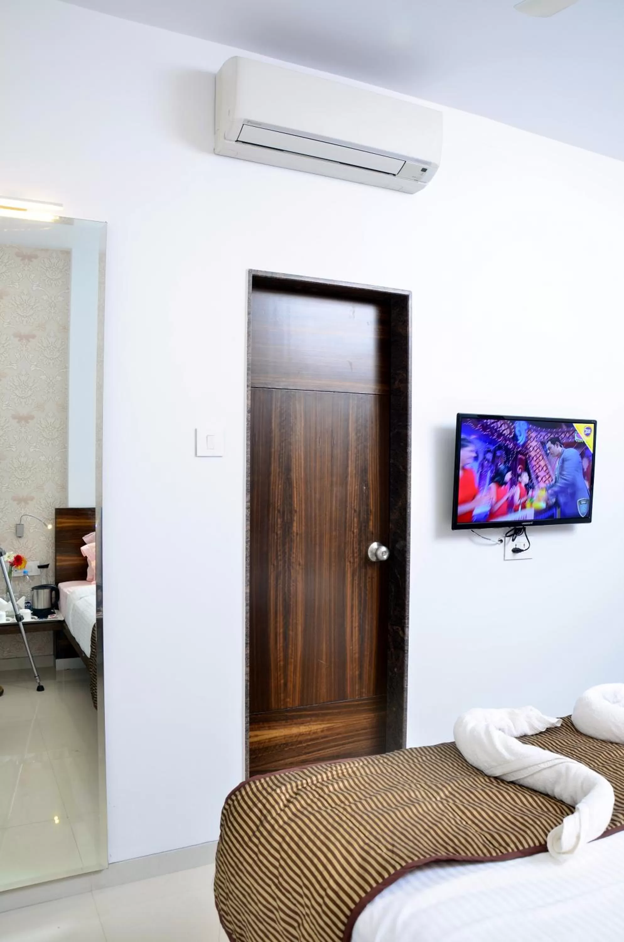 Bedroom, Bed in Hotel SRI SRI EXECUTIVE KOLHAPUR NEAR MAHALAXMI TEMPLE