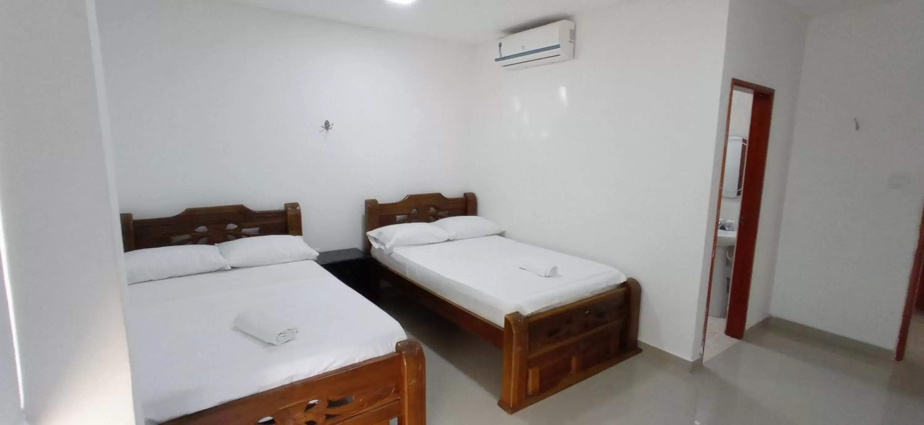 Superior Triple Room in Hotel Tamaca Real Superior Triple Room in Hotel Tamaca Real