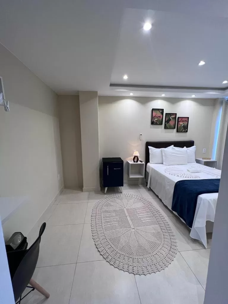 Bed in Pousada Arraial Tropical