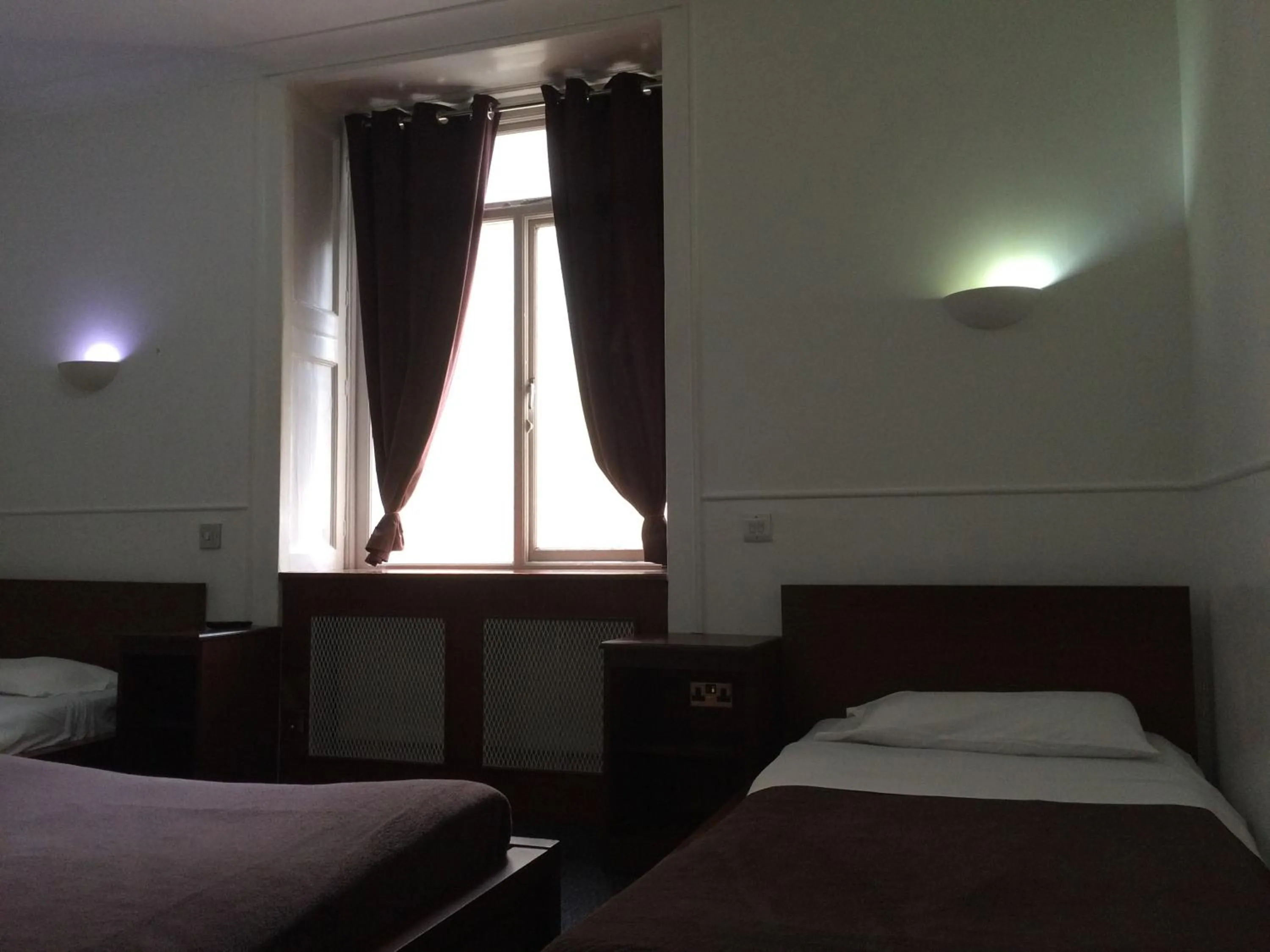 Bed in London Continental Hotel