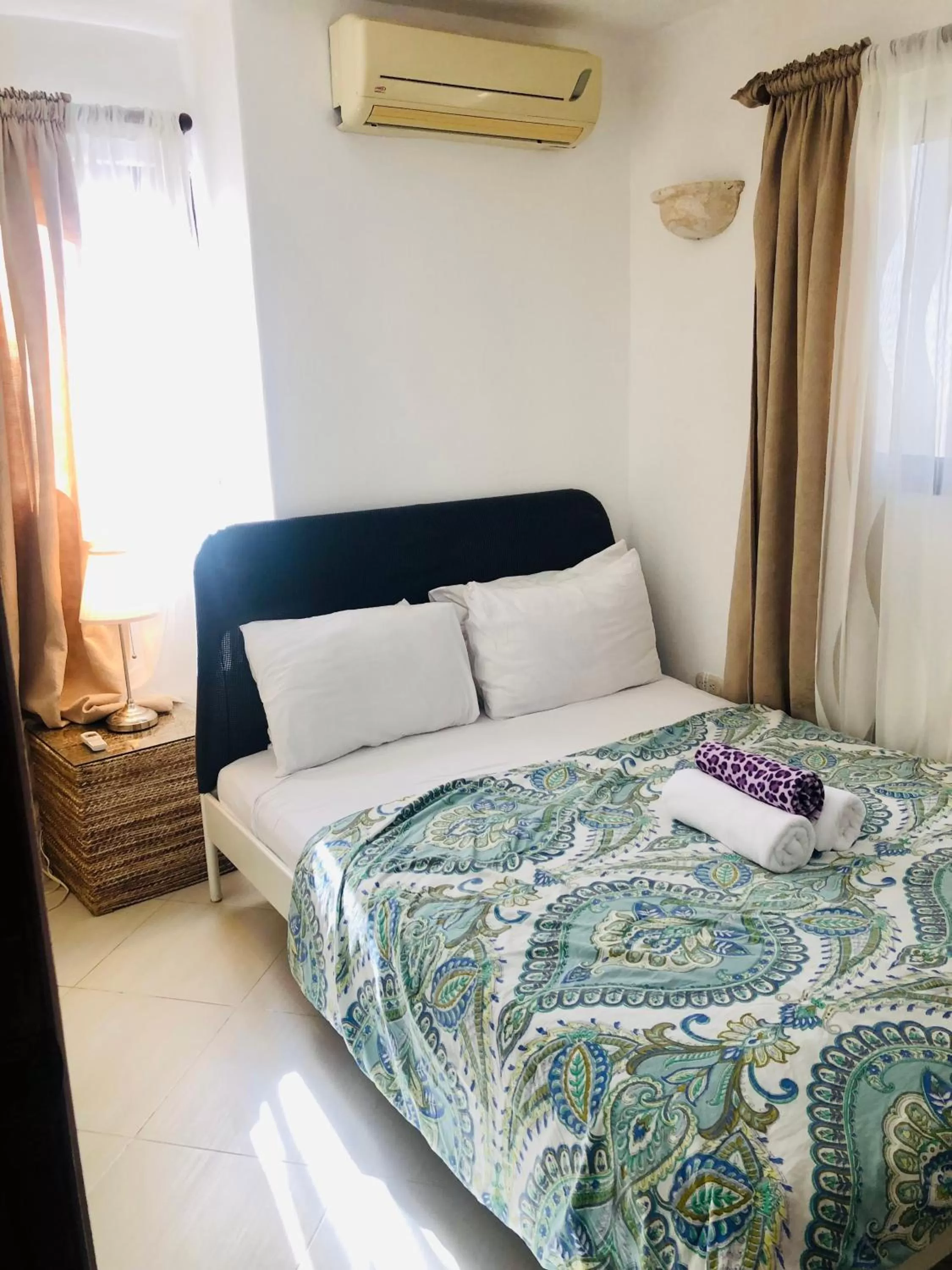 Bed in Los Corales Luxury Villas Beach Club and Spa