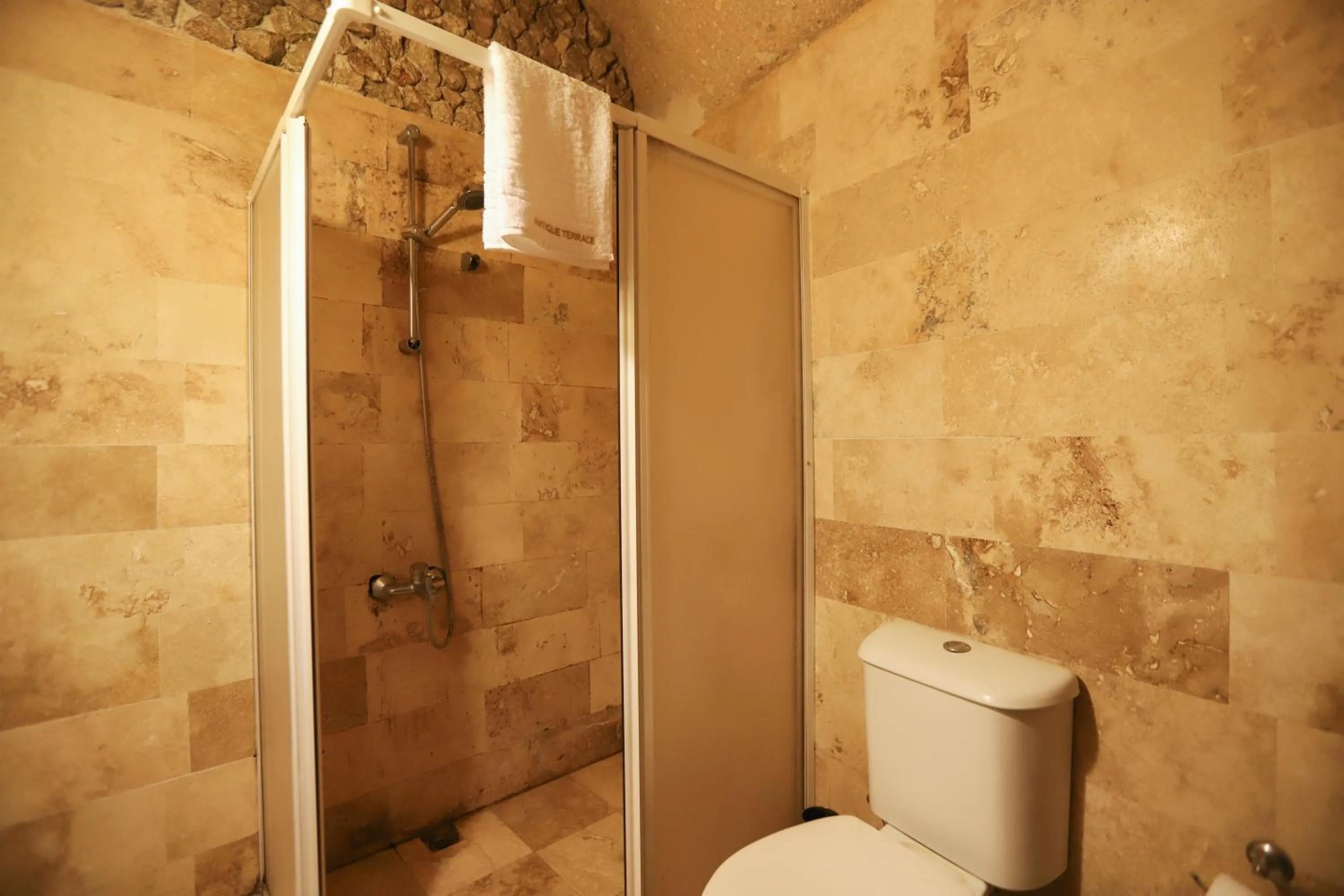 Bathroom in Antique Terrace Cave Suites