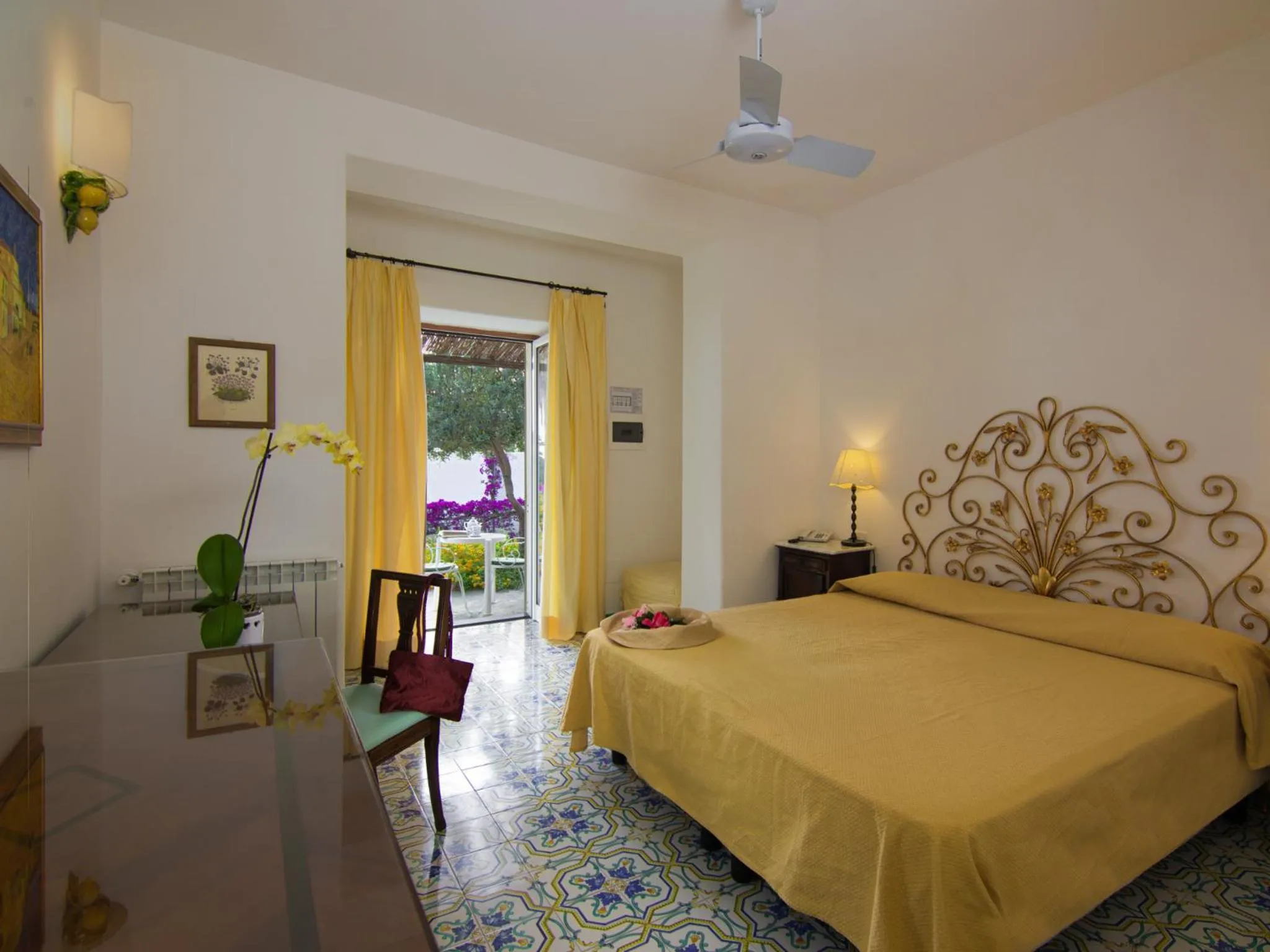 Bed in Semiramis Hotel De Charme & Pools