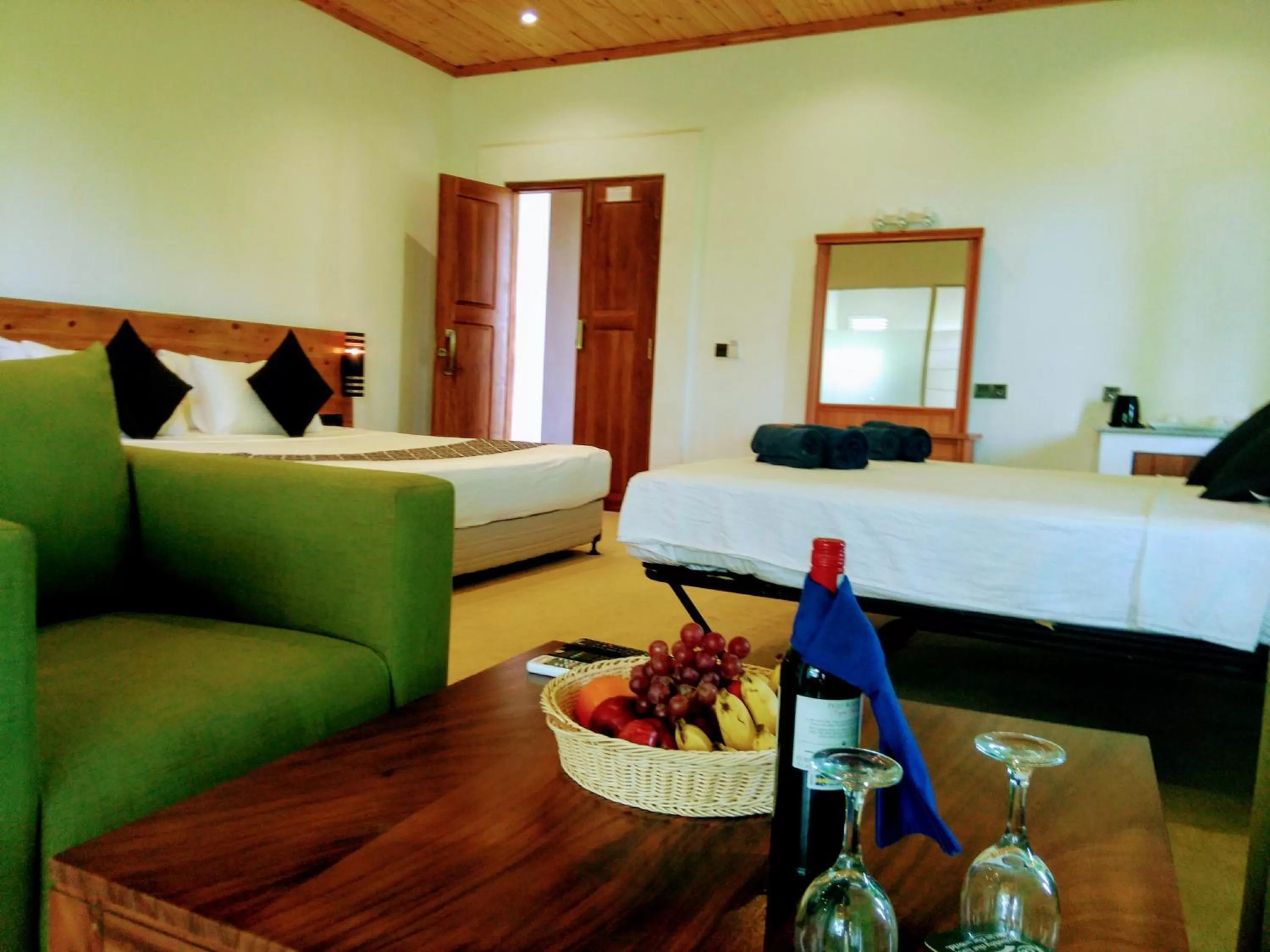 Seating area, Bed in Nice Place Resort