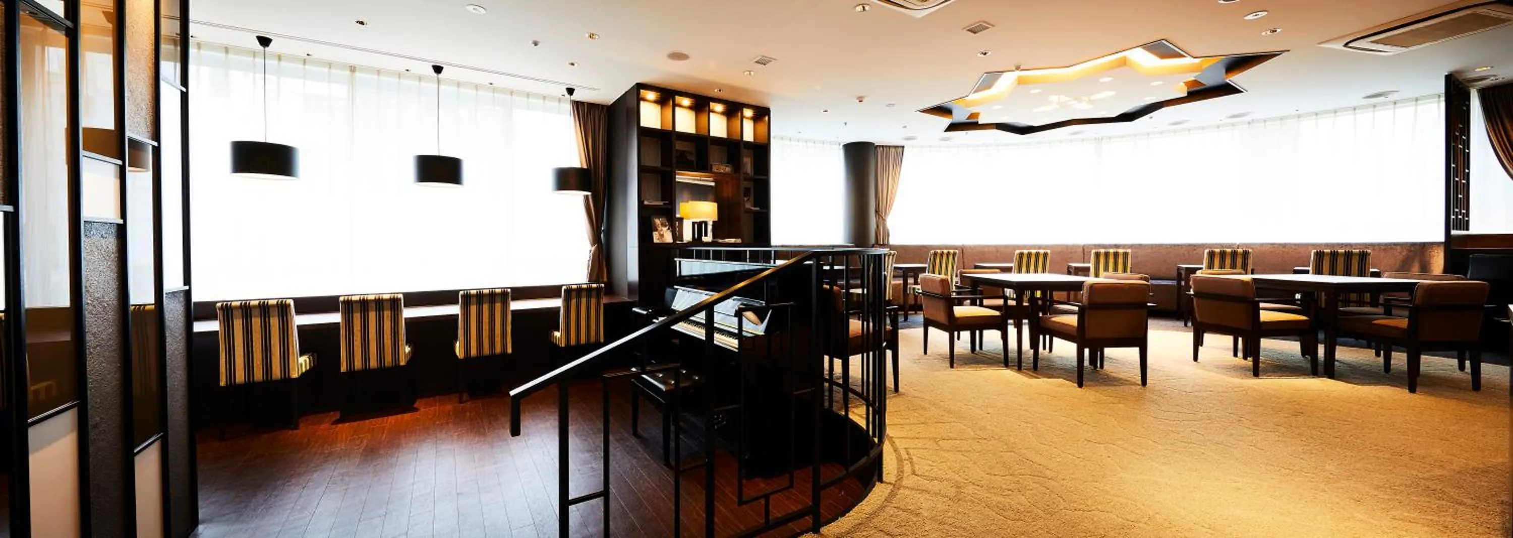 Communal lounge/ TV room in Ginza Grand Hotel